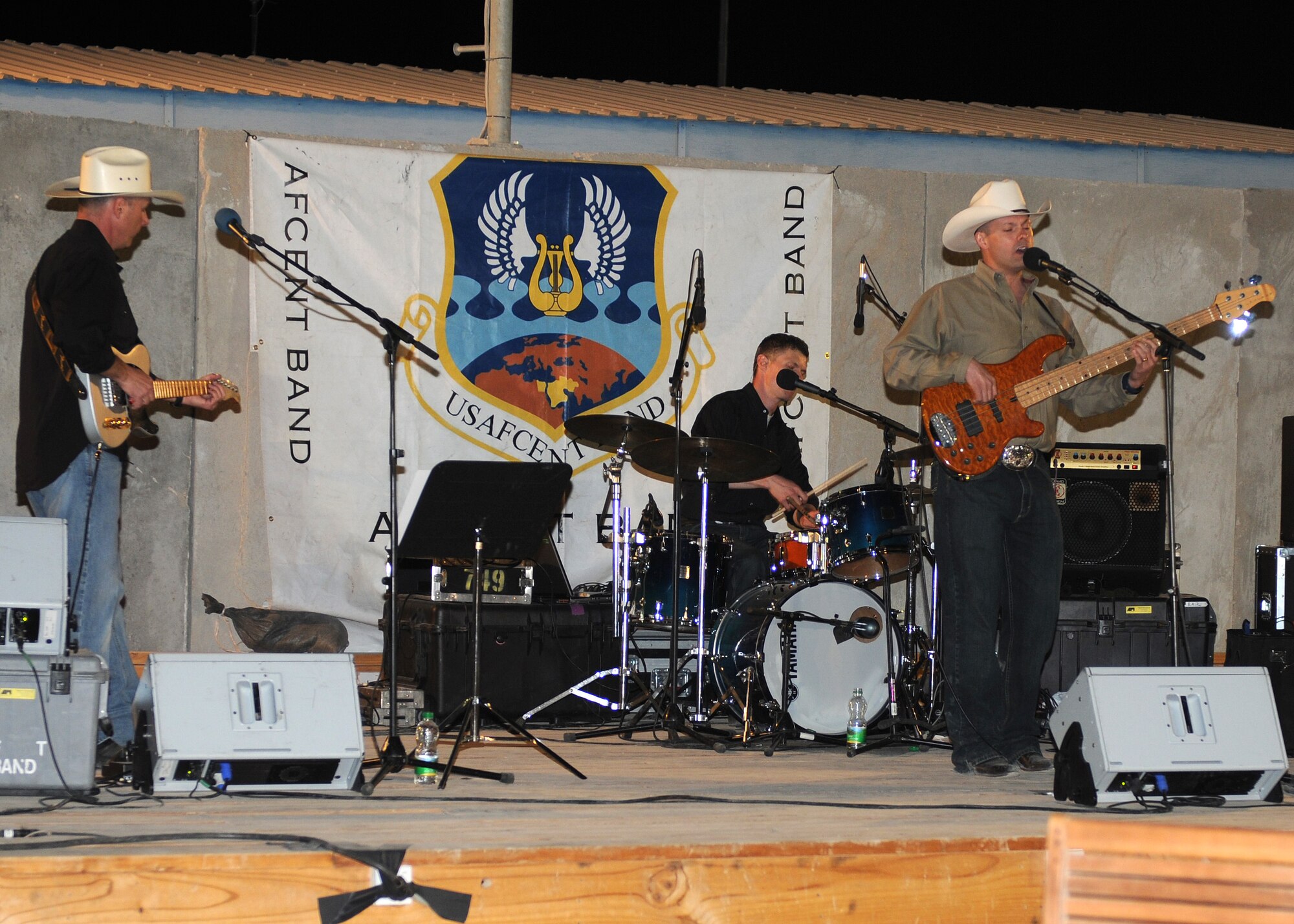 The U.S. Air Forces Central Band, Wild Blue Country, plays for Airmen at an undisclosed location in Southwest Asia. (U.S. Air Force photo by Master Sgt. Karl Bradley)