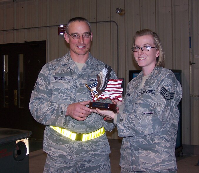 Senior Master Sgt. Matt Turcotte, 916th Maintenance Squadron, receives the award for taking first place in the Seymour Johnson Fit to Fight Challenge. (USAF courtesy 4FW AMDS)