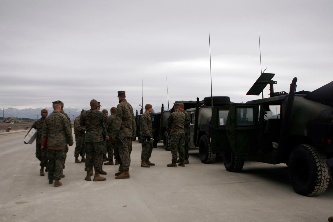Marines with the 31st Marine Expeditionary Unit, prepare to conduct a route reconnaissance convoy, March 19. The Marines are conducting the convoy in preparation for humanitarian aid and disaster relief operations. Navy and Marine Corps involvement is part of a larger U.S. government response, coordinated through the U.S. Department of State, after a 9.0 earthquake and subsequent tsunami struck Japan causing widespread damage. As part of Operation Tomodachi, the 31st MEU is ready to support our Japanese partners and to provide assistance when called upon.