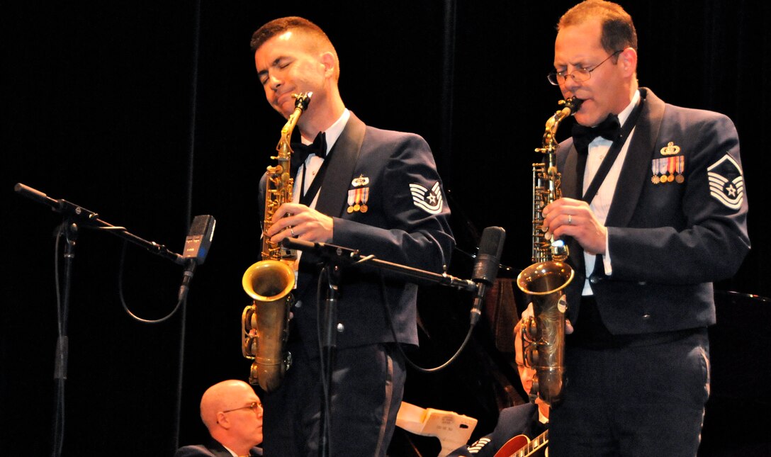 Tech. Sgt. Tyler K. Kuebler and Master Sgt. Andrew Axelrad, alto saxophonists with the U.S. Air Force Band Airmen of Note, are featured on a duet March 17 at Salem High School, Salem, Va. The Note is traveling through Virginia, Tennessee, Mississippi and Arkansas on it’s 2011 Spring Tour. (U.S. Air Force photo by Airman 1st Class Tabitha N. Haynes)