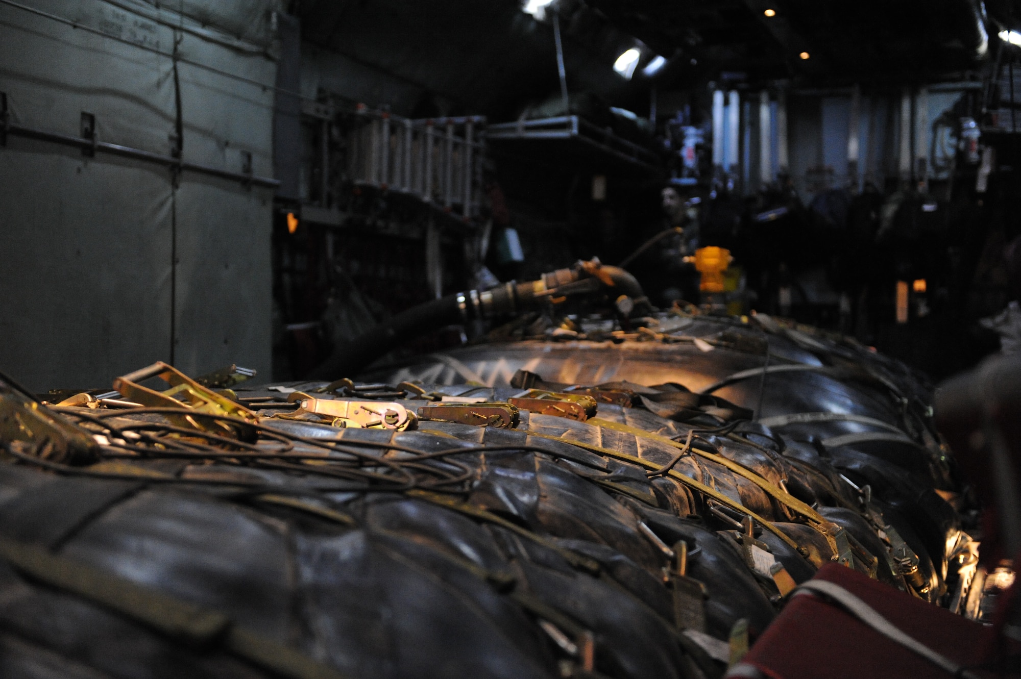 MISAWA AIR BASE, Japan–A U.S. Air Force C-130 Hercules arrives here delivering fuel in support of Operation Tomodachi Mar 18. The C-130 can carry two fuel bladders each of which hold 3,000 gals fuel.  (U.S. Air Force Photo/Tech. Sgt. Russell J. McBride)