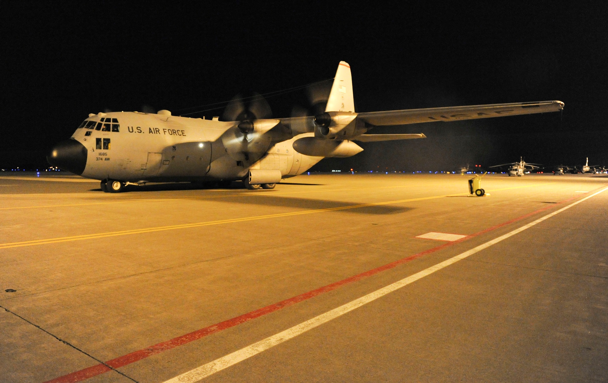 MISAWA AIR BASE, Japan–A U.S. Air Force C-130 Hercules arrives at Misawa Air Base Mar 18. The crew from Yokota Air Base is delivering fuel in support of Operation Tomodachi. (U.S. Air Force Photo/Tech. Sgt. Russell J. McBride)