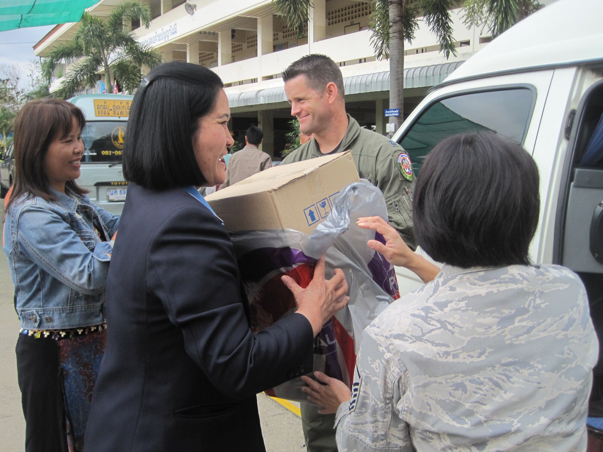 KORAT, Thailand - Airmen deliver donations to the Panyahukul Handicapped School during a community outreach event in Korat, Thailand, March 18. The Airmen are participating in Exercise Cope Tiger 2011, an annual, multilateral, joint field training exercise currently being conducted at Korat and Udon Thani Royal Thai Air Bases March 14 through 25. (U.S. Air Force Photo/ Capt. Kirsten Udd)                               