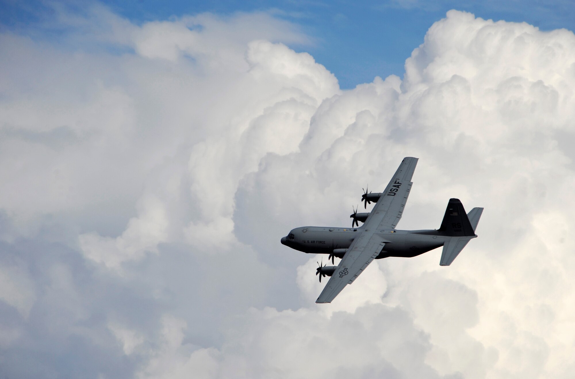 A U.S. Air Force C-130J Hercules, from the 37th Airlift Squadron, Ramstein Air Base, Germany, performs touch-and-goes at Campia Turzii, Romania, March 18, 2011.  Aircraft and personnel were conducting off sight training at several locations in Romania as part of Carpathian Spring 2011, a building partnership capacity exercise where members of U.S. military joined their Romanian counterparts to learn from one another and strengthen alliances. (U.S. Air Force Photo by Tech Sgt. Jocelyn L. Rich)(released)