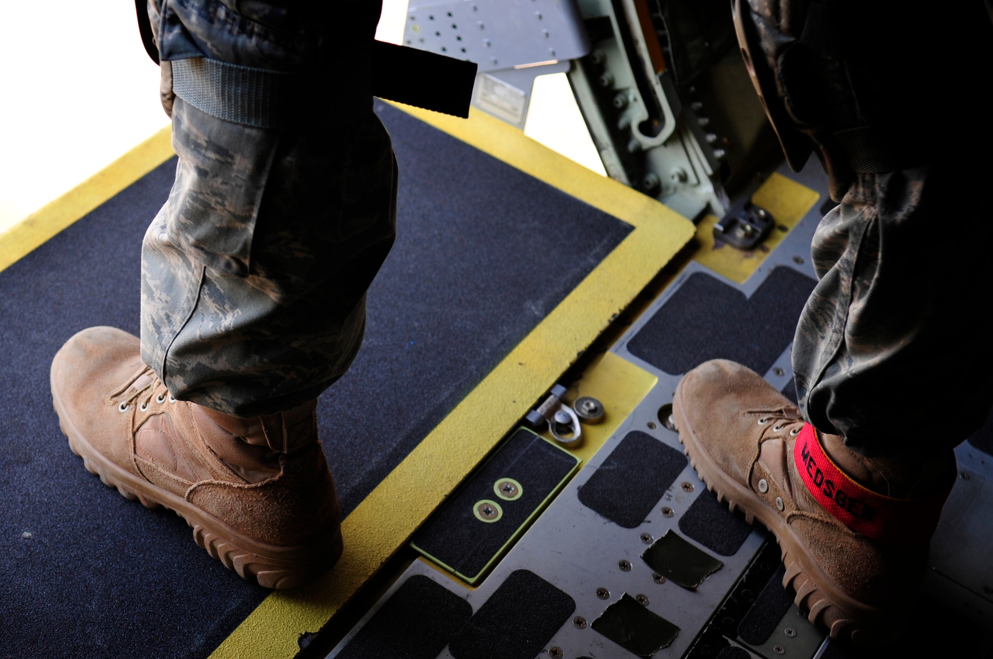 U.S. Air Force Maj. Jason Medsger, 435th Security Forces Squadron, commander, stands in a troop door of a C-130J, in preparation of a static line jump over a landing zone near Campia Turzii, Romania, March 18, 2011.  This jump was conducted as a part of Carpathian Spring 2011, a building partnership capacity exercise where members of U.S. military joined their Romanian counterparts to learn from one another and strengthen alliances. (U.S. Air Force Photo by Tech Sgt. Jocelyn L. Rich)(released)