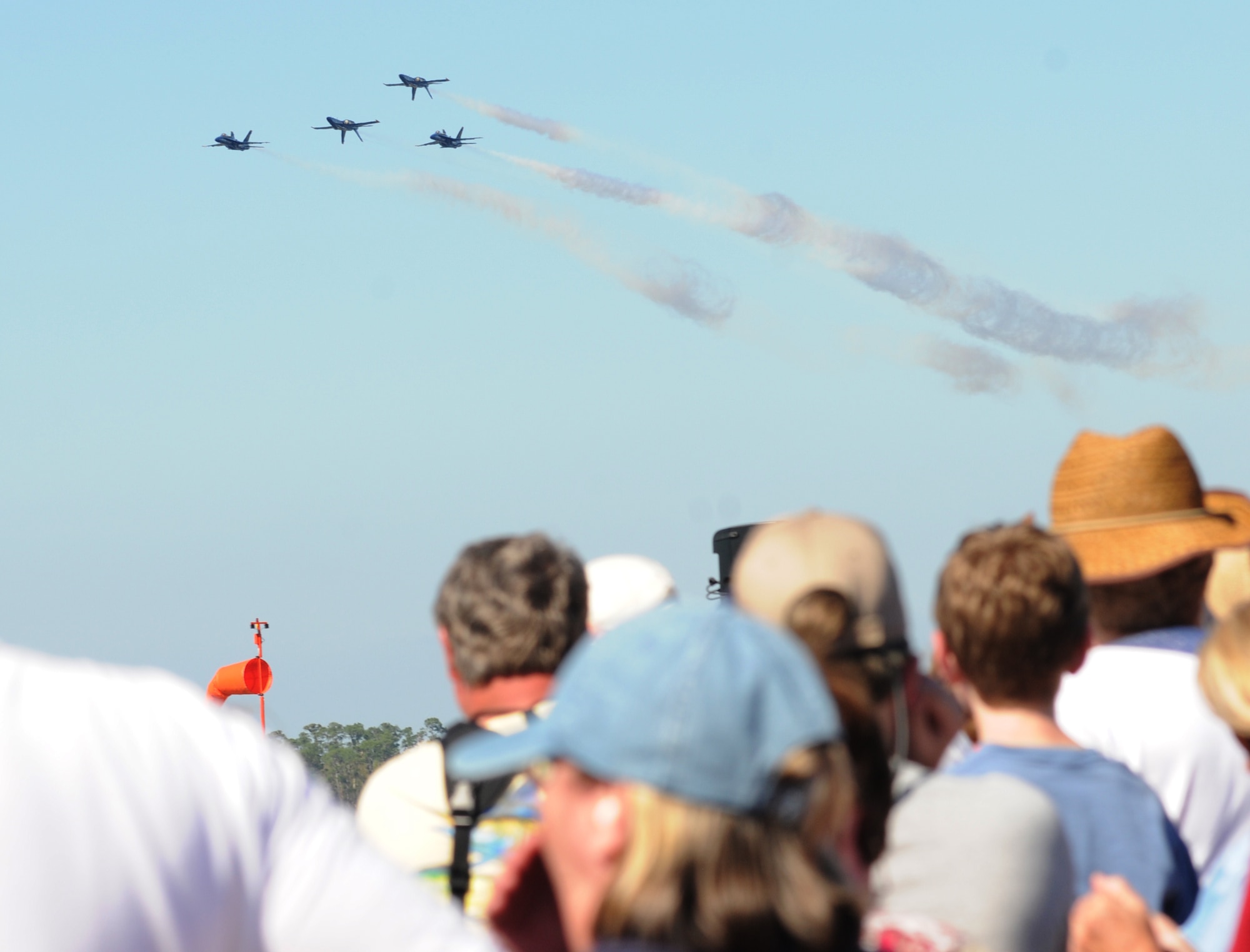 An estimated 160,000 people attended Keesler’s open house and air show, Angels Over the Bay, March 19 and 20. The celebration of Keesler’s 70 years of heritage included the Navy Blue Angels and Army Golden Knights along with many other performers, static displays and vendors. Last year, the Blue Angels performed 68 air shows at 35 U.S. sites in their F/A-18 Hornets for more than 8 million spectators. Since its inception in 1946, the Blue Angels have performed for more than 463 million fans.  (U.S. Air Force photo by Kemberly Groue)