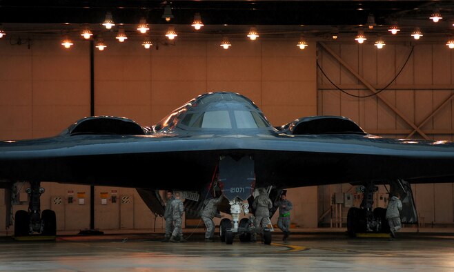 WHITEMAN AIR FORCE BASE, Mo. -- 509th Aircraft Maintenance Squadron, maintainers and crew chiefs, prepare the B-2 Spirit for Operation Odyssey Dawn March 19, 2011. (U.S. Air Force photo by Senior Airman Kenny Holston)(Released)

