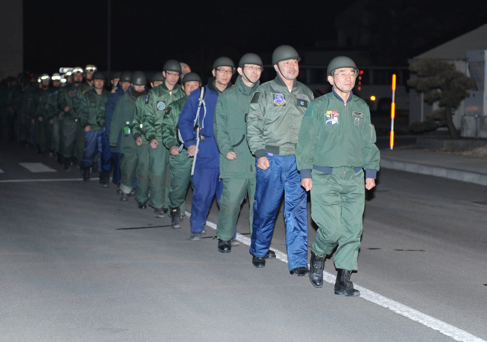 MISAWA AIR BASE, Japan– Japanese Air Self-Defense Force Col. Junichiro Masaoka, Northern Air Defense Force Head Quarters Disaster Relief Team inspector general, return Mar. 19. He commanded a team of 11 officers and 151 enlisted for disaster relief operations in the Yamada area from Mar. 12-19. (U.S. Air Force Photo/Tech. Sgt. Russell J. McBride)