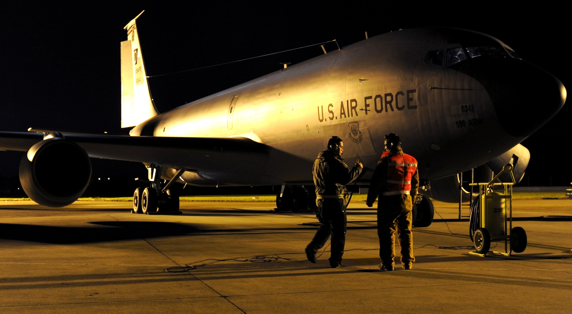 RAF MILDENHALL, England -- Members of the 100th Air Refueling Wing Aircraft Maintenance Squadron prepare a KC-135 Stratotanker for a refueling mission in support of Joint Task Force Odyssey Dawn. JTF Odyssey Dawn is the U.S. Africa Command task force established to provide operational and tactical command and control of U.S. military forces supporting the international response to the unrest in Libya and enforcement of United Nations Security Council Resolution (UNSCR) 1973. UNSCR 1973 authorizes "all necessary measures" to protect civilians in Libya under threat of attack by Gadhafi regime forces. JTF Odyssey Dawn is commanded by U.S. Navy Admiral Sam Locklear. (U.S. Air Force photo by Senior Airman Tabitha M. Lee)
