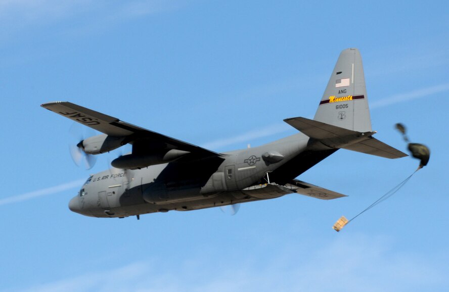 A Low Cost Low Altitude bundle tumbles from the ramp of a 133rd Airlift Wing Minnesota Air National Guard C-130 Hercules Feb. 28, 2011.During the week of Feb. 28th, 2011 Airmen and the C-130 Hercules of the 133rd Airlift Wing, Minnesota Air National Guard deployed for training to Yuma Proving Ground, Yuma, Ariz.  During the week the 133rd AW practiced Low-Cost Low-Altitude airdrops this knowledge and experience will be directly applied during deployment to Afghanistan. The LCLA bundles are more accurate and use expendable parachutes weighing in at 80 to 500 pounds. LCLA is well suited for small units on patrol or in remote outposts where they don't have the equipment or manpower to deal with the larger container delivery system bundles. U.S. Air Force photo by Tech. Sgt. Erik Gudmundson