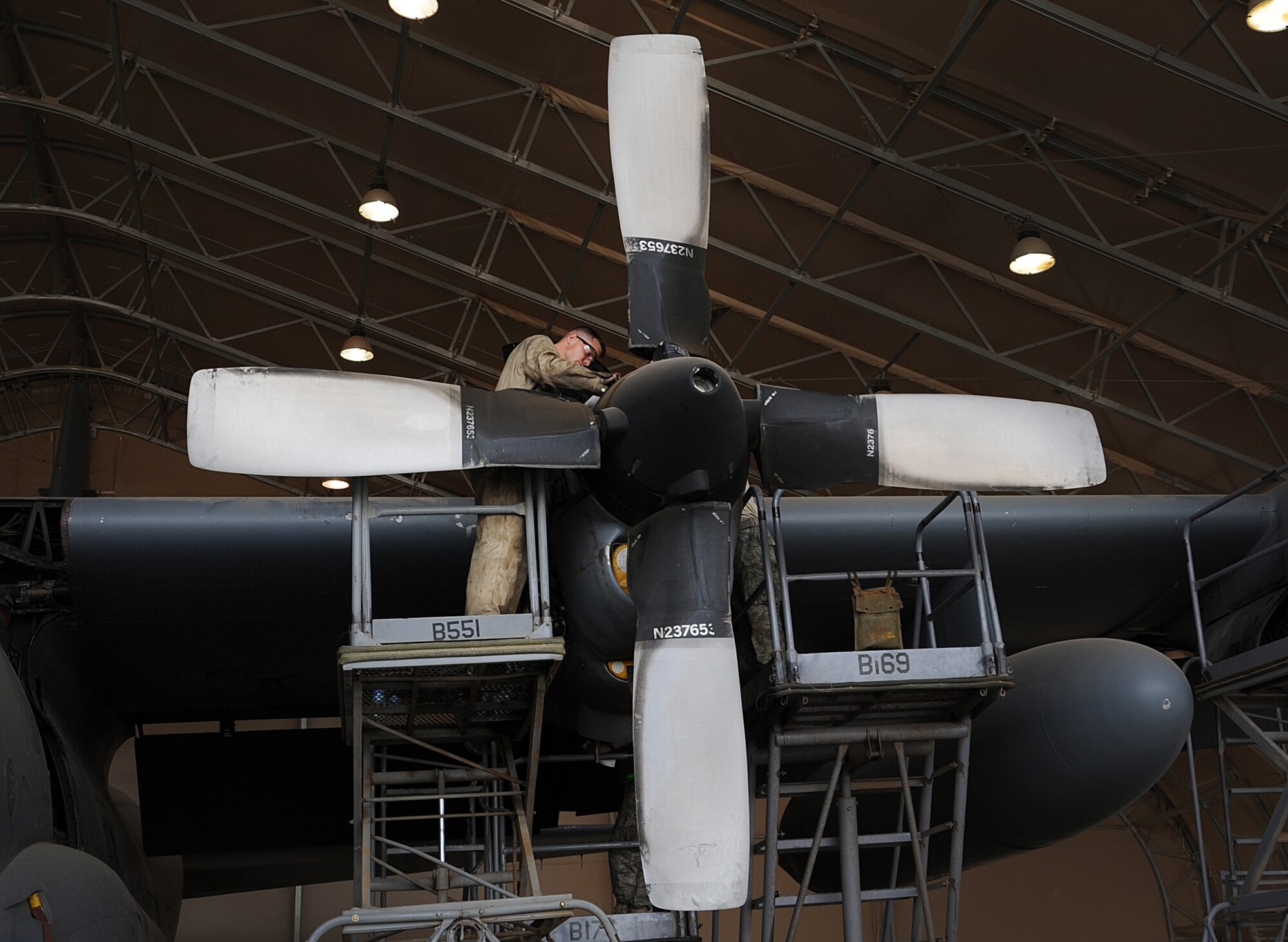 Staff Sgt. Aaron McInturf works on a C-130 Hercules propeller March 1. A C-130H has four propellers that must be properly maintained. Sergeant McInturf is a jet propulsion journeyman with the 386th Expeditionary Maintenance Group. (U.S. Air Force photo by Senior Airman Cynthia Spalding)