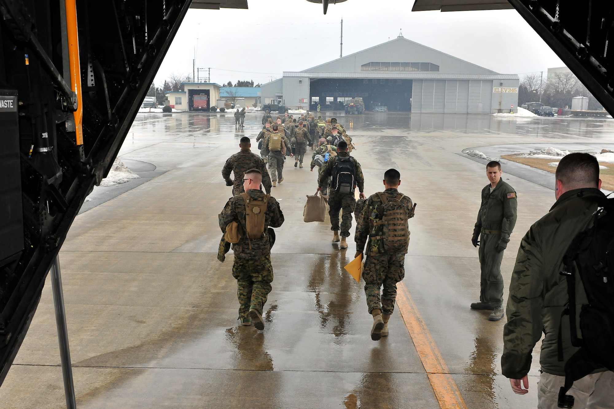 YAMAGATA, Japan -- Marines from Naval Air Facility Atsugi, Japan, exit a MC-130 here March 19. The Marines were transported by the 17th Special Operations Squadron from Kadena Air Base, Japan, to Yamagata in support of Operation Tomodachi. (U.S. Air Force photo/Master Sgt. Jeromy K. Cross)









