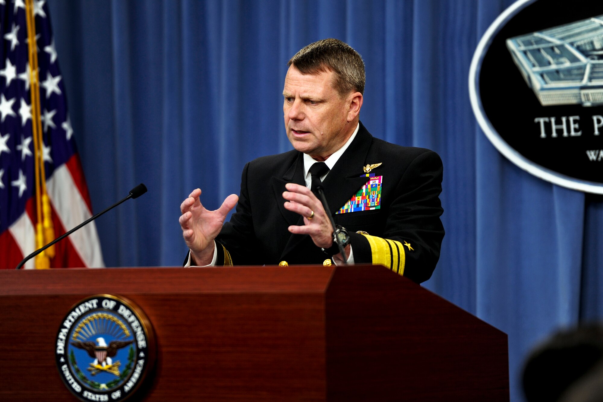 Navy Vice Adm. William E. Gortney, director of the Joint Staff, briefs the press on "Operation Odyssey Dawn" at the Pentagon, March 19, 2011.  Admiral Gortney announced that coalition forces have launched the operation to enforce U.N. Security Council Resolution 1973, which protects the Libyan people from their ruler. (DOD photo/Cherie Cullen)