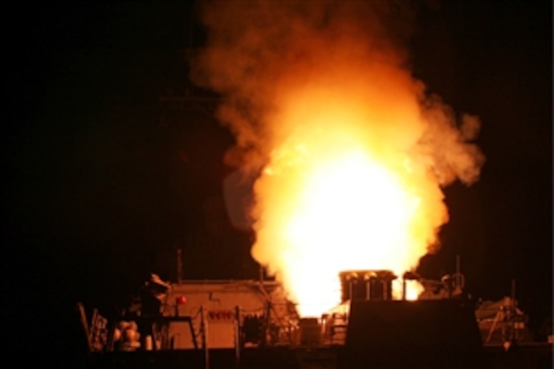 The guided-missile destroyer USS Stout launches a Tomahawk missile to support Operation Odyssey Dawn in the Mediterranean Sea, March 19, 2011. This was one of approximately 110 cruise missiles fired from U.S. and British ships and submarines that targeted about 20 radar and anti-aircraft sites along Libya's Mediterranean coast.