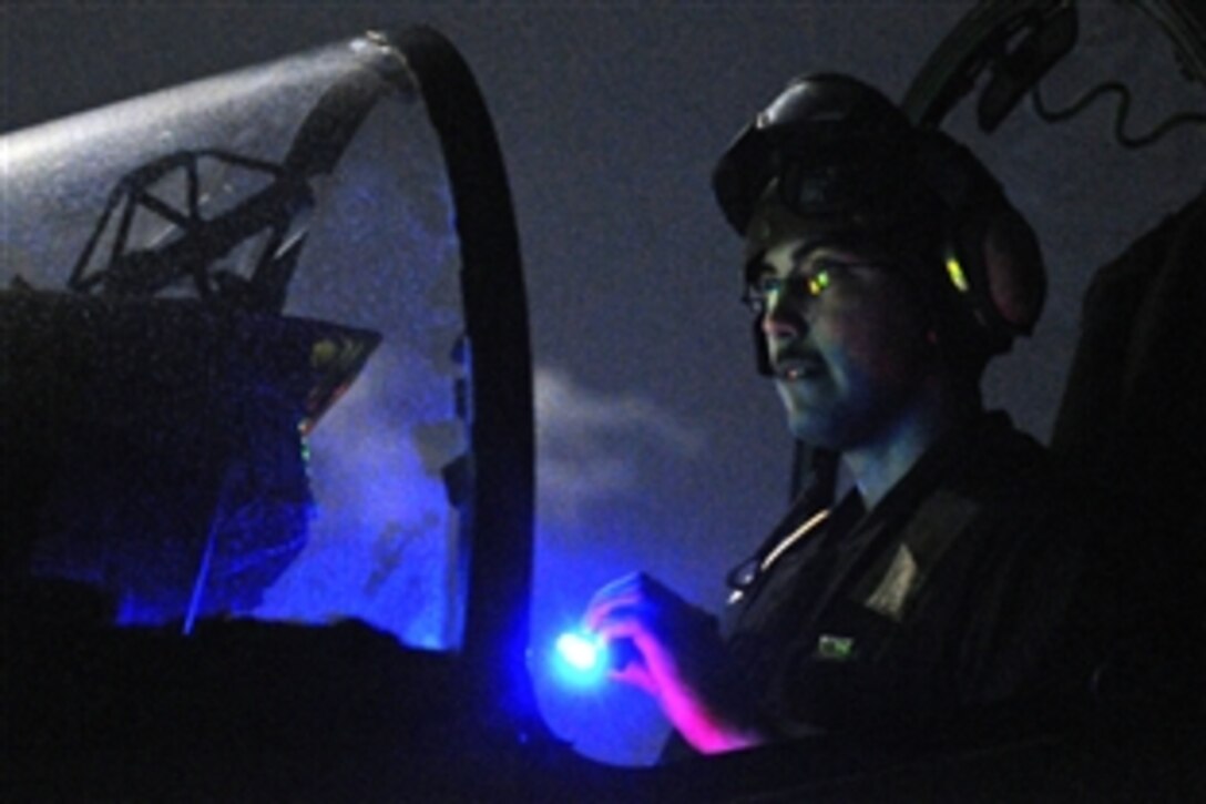 U.S. Marine Corps Cpl. Sean Moberly runs preflight checks on an AV-8B Harrier on the flight deck of amphibious assault ship USS Kearsarge to prepare for Operation Odyssey Dawn missions in the Mediterranean Sea, March 19, 2011. Moberly is assigned to Marine Medium Tiltrotor Squadron 266, 26th Marine Expeditionary Unit.

Joint Task Force Odyssey Dawn is the U.S. Africa Command task force established to provide operational and tactical command and control of U.S. military forces supporting the in