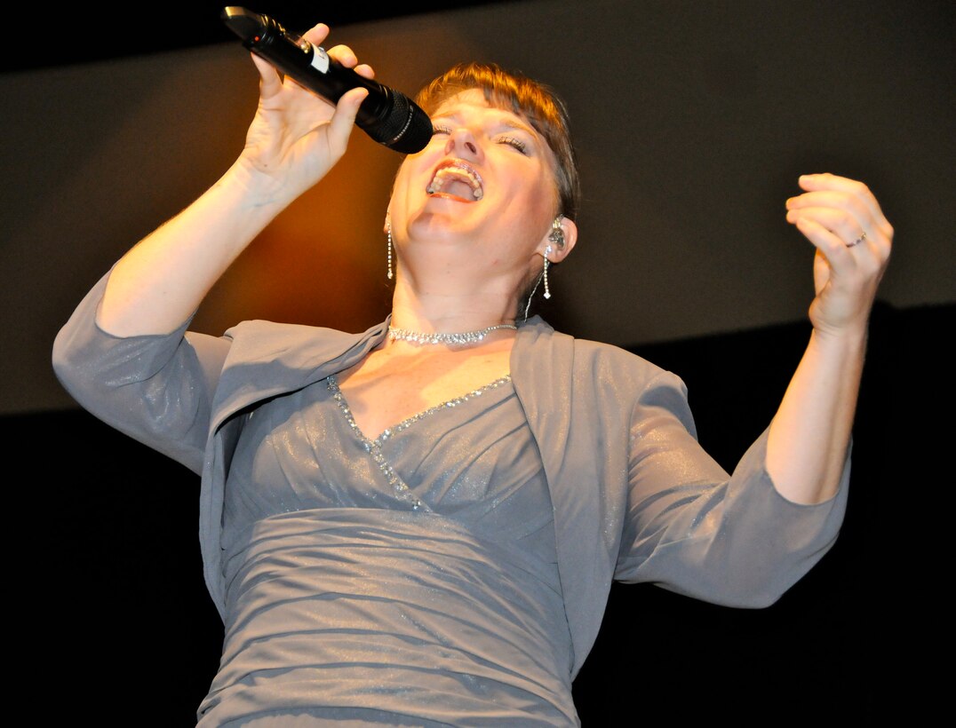 Tech. Sgt. Paige Martin, vocalist with The U.S. Air Force Band Airmen of Note, entertains the audience March 18 at the Meadowview Convention Center in Kingsport, Tenn. The Note is traveling through Virginia, Tennessee, Mississippi and Arkansas on it’s 2011 Spring Tour. (U.S. Air Force photo by Airman 1st Class Tabitha N. Haynes)