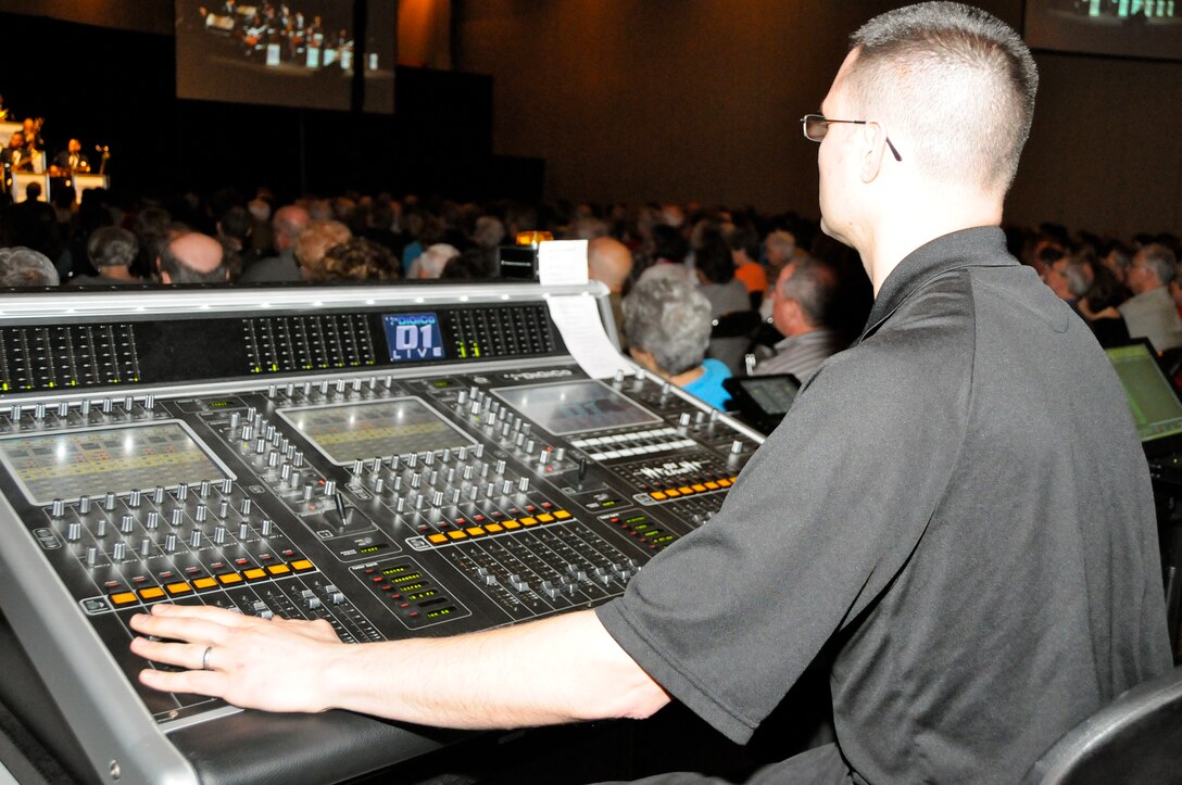 Tech. Sgt. Adam Dempsey, chief audio engineer with The U.S. Air Force Band Airmen of Note, adjusts the sound levels March 18 at the Meadowview Convention Center in Kingsport, Tenn. The Note is traveling through Virginia, Tennessee, Mississippi and Arkansas on it’s 2011 Spring Tour. (U.S. Air Force photo by Airman 1st Class Tabitha N. Haynes)