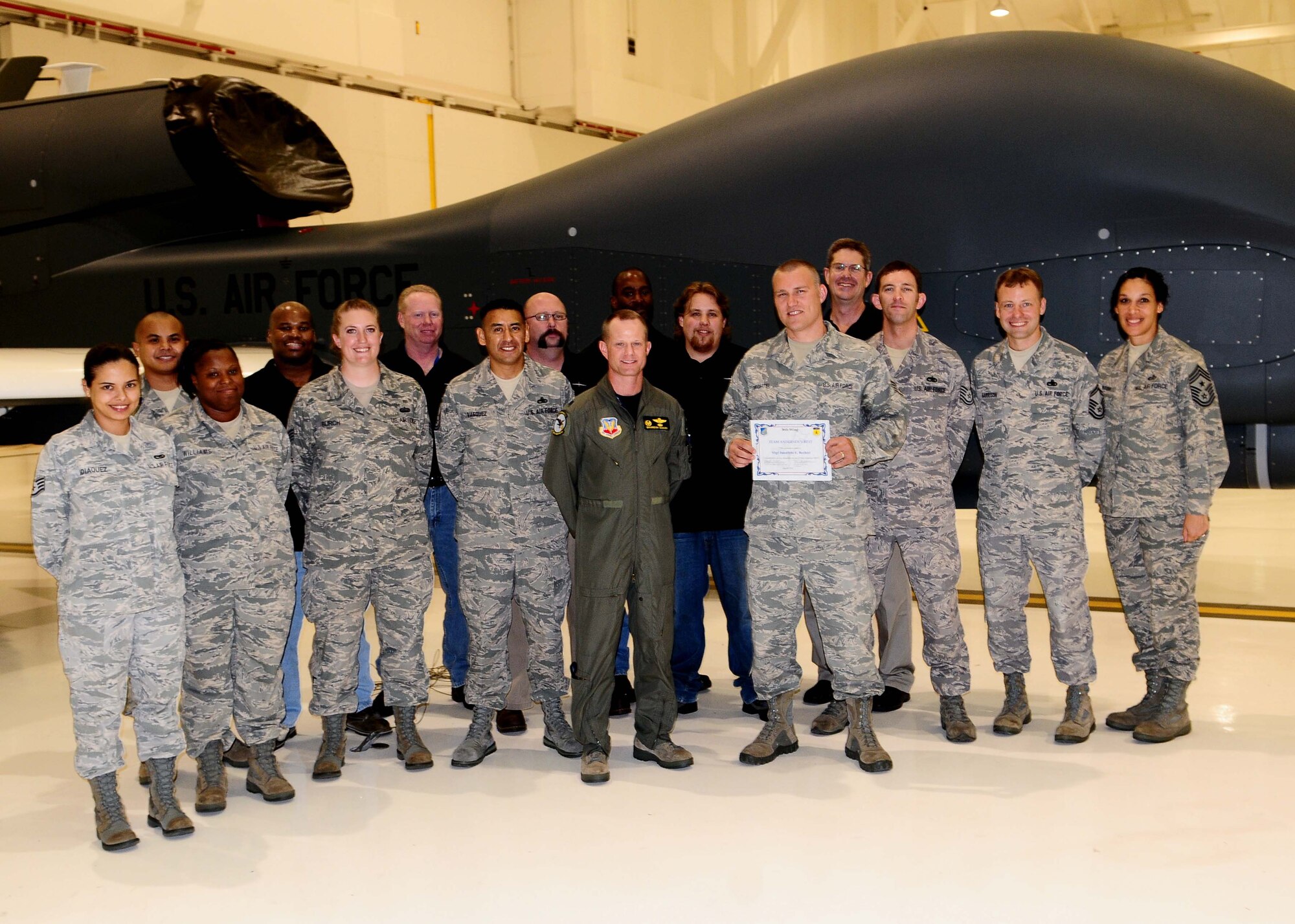 Staff Sgt. Jonathon Bechtel, Detachment 3 noncommissioned officer in charge of supply, stands with his peers after being awarded Andersen's Best here, March 10. Sergeant Bechtel was recognized for his superb job performance as the mastermind in providing all maintenance material to support aircraft and ground station. In addition Bechtel’s supply expertise was also used to support the remote satellite downlink site providing equipment and materials ahead of the military ADVON team (U.S. Air Force photo/Airman 1st Class Jeffrey Schultze)

Andersen's Best is a recognition program which highlights a top performer from the 36th Wing. Each week, supervisors nominate a member of their team for outstanding performance and the wing commander presents the selected Airman with an award. 

To nominate your Airman for Andersen's Best, contact your unit chief or superintendent explaining their accomplishments
