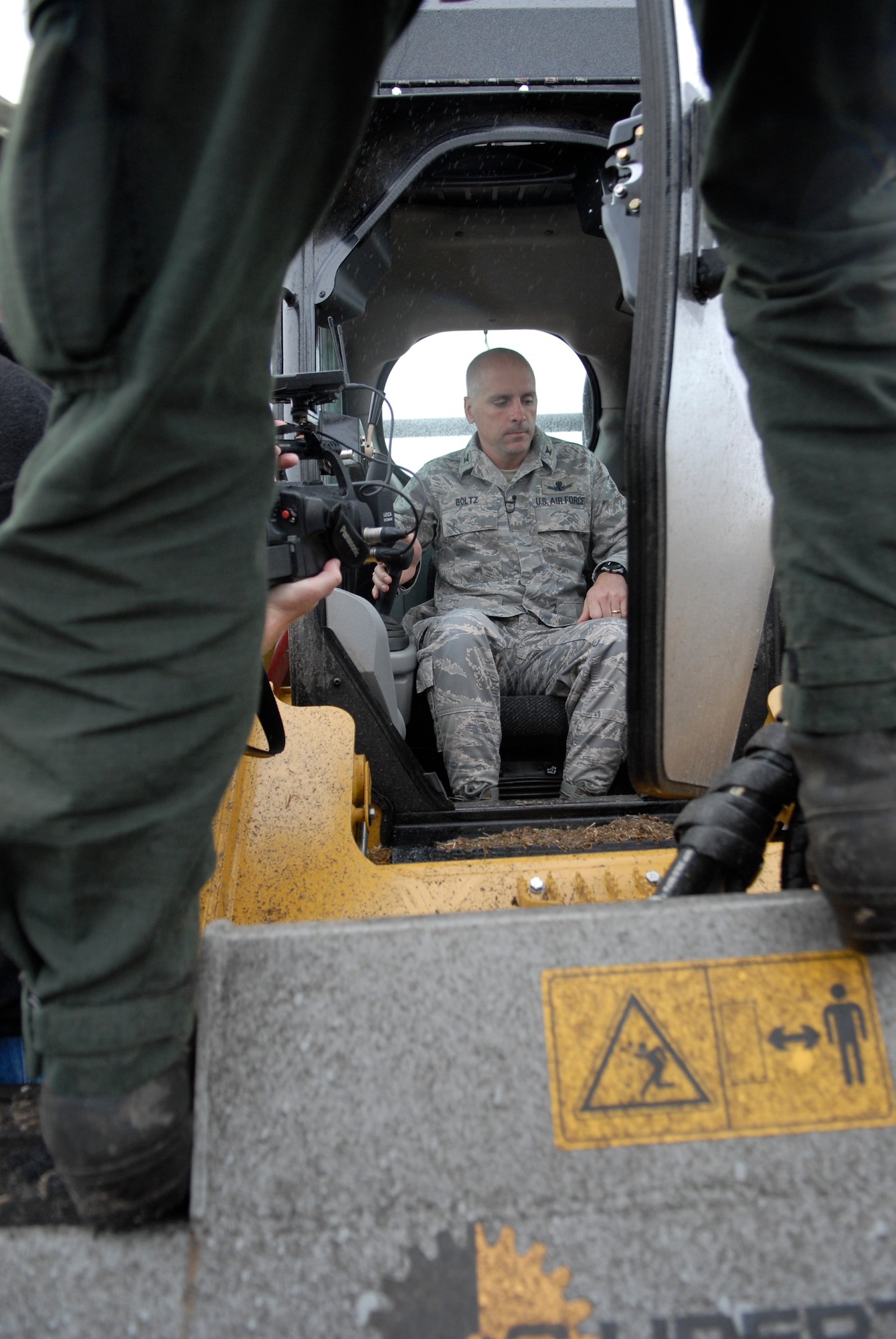 VANDENBERG AIR FORCE BASE, Calif. - Col. Richard Boltz, 30th Space Wing commander, getting a crash course in Masticator operation from Vandenberg Hot Shots superintendant Jesse Hendricks here Wednesday, March 16, 2011. (U.S. Air Force photo/1st Lt. Ann Blodzinski)
