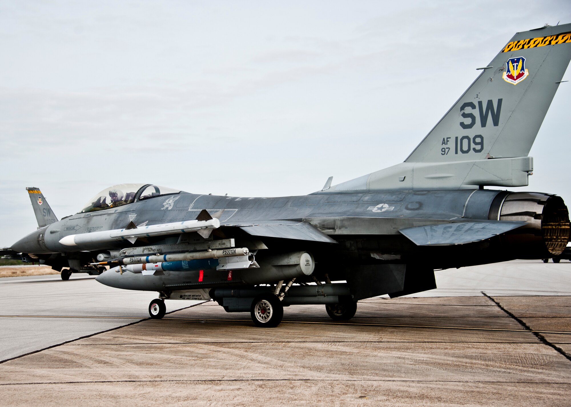 An F-16 Fighting Falcon loaded with a Guided Bomb Unit-12 from the 20th Fighter Wing waits to taxi out for a sortie March 14 at Eglin Air Force Base, Fla.  More than 10 F-16s from the 20th Fighter Wing were on hand to participate in the air-to-ground weapons system evaluation program known as Combat Hammer at Eglin.  The week-long evaluation is conducted by the 86th Fighter Weapons Squadron, located here.  The squadron hosts 20 to 25 evaluations at Hill and Eglin each year, assessing weapon system performance, reliability, capabilities, and limitations in realistic combat scenarios against representative real-world targets.  (U.S. Air Force photo/Samuel King Jr.)