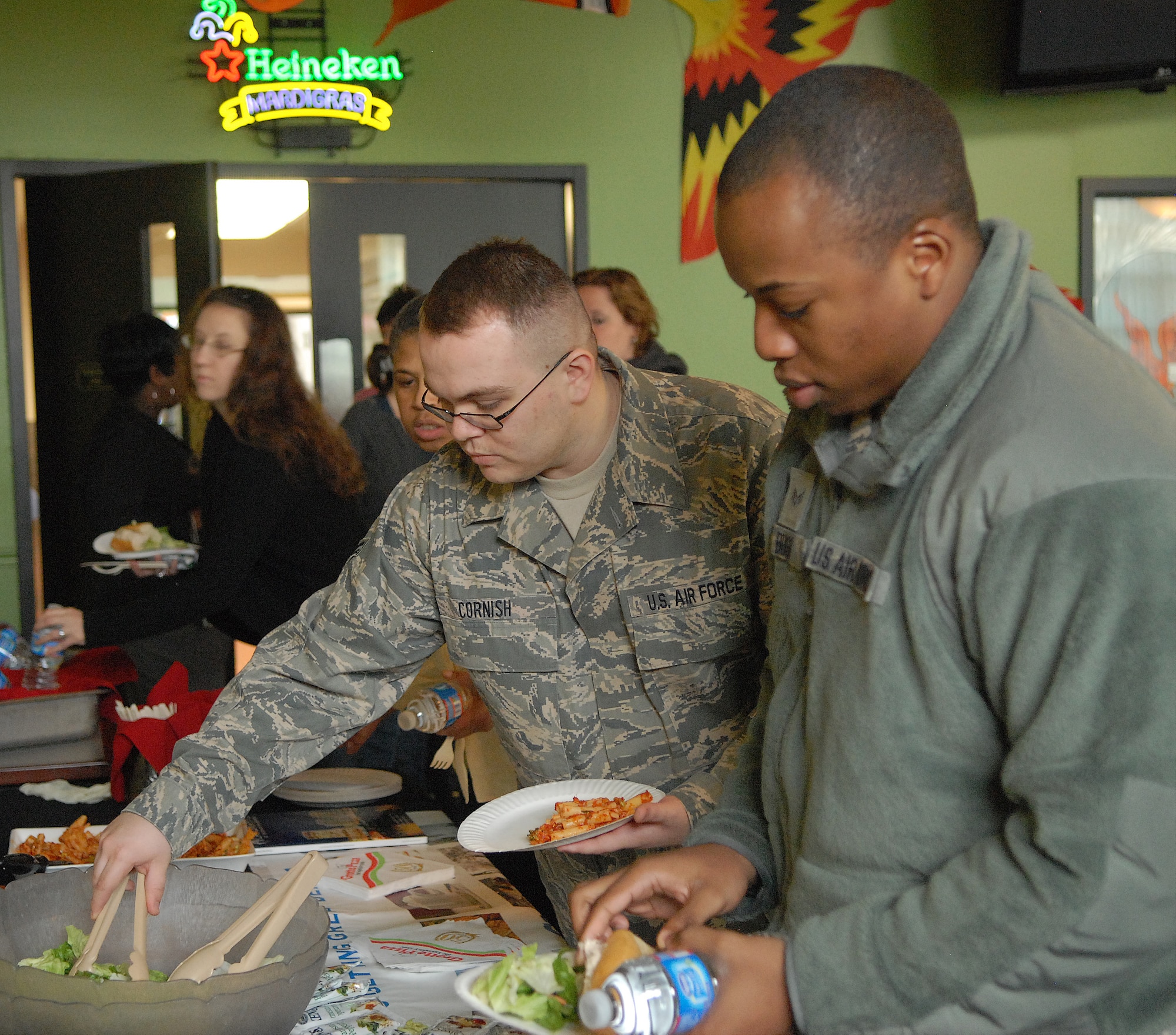 Team Dover members enjoy a free, health-conscious buffet during the 2011 Biggest Winner celebration lunch March 16, 2011, at The Landings Club, at Dover Air Force Base, Del. The lunch was hosted by the Health and Wellness Center to mark the end of the Biggest Winner competition. (U.S. Air Force photo by Airman 1st Class Matthew Hubby)

