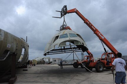 Randolph Air Force Base, Texas, 21 Mar 11:    C-17 Aircraft is reassembled at Randolph Air Force Base by contractors from Worldwide Aircraft Recovery LTD.  It will be developed into training tool for aeromedical missions over the next year and then transported to Wright-Patterson AFB, Ohio. (U.S. Air Force photo/Rich McFadden) (Released)