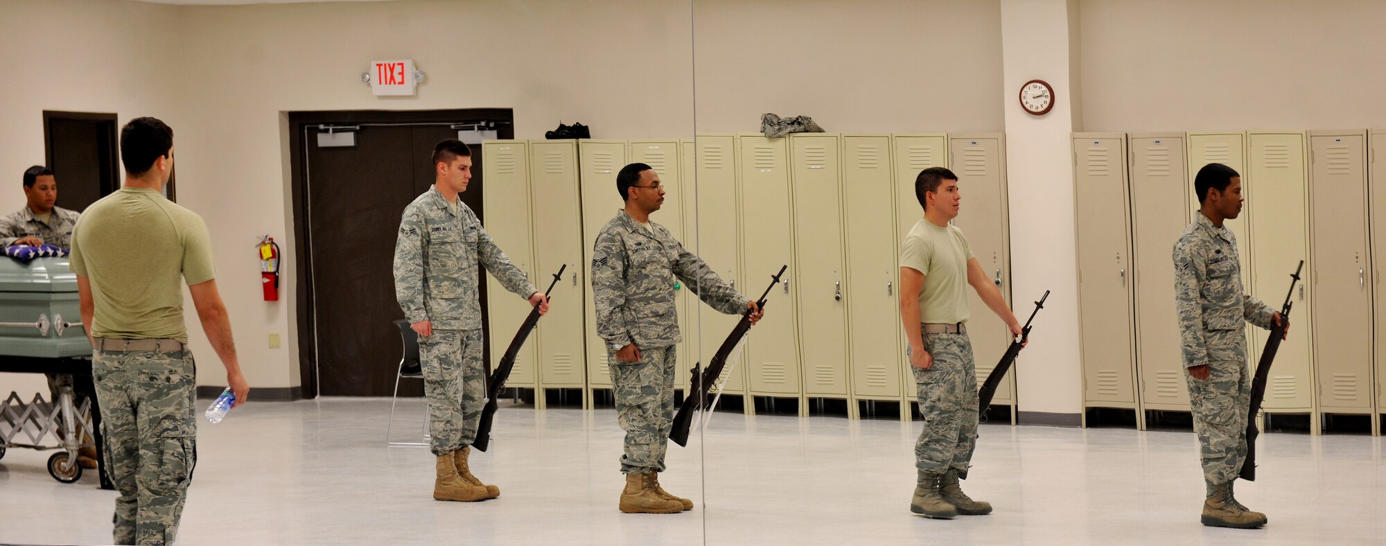 MOODY AIR FORCE BASE, Ga.-- A reflection of Moody AFB Honor Guard members train during a session March 21. The members learned the basic Honor Guard moves so they could be attached to a flight. (U.S. Air Force/Airman 1st Class Joshua Green) (RELEASED)

