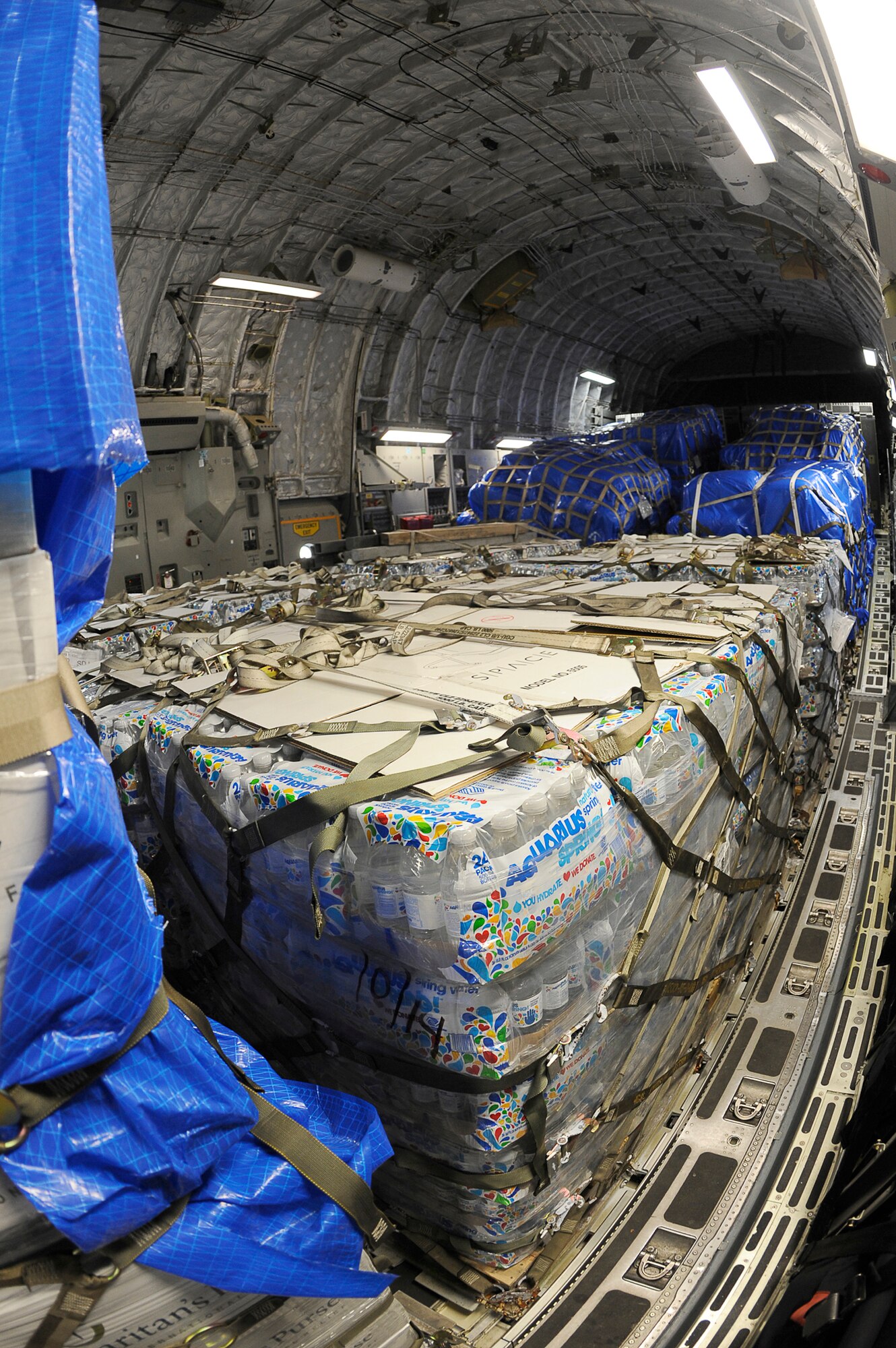 Humanitarian supplies are transported on a C-17 Globemaster III aircraft from Yokota Air Base to Sendai Airport, Japan, March 20, 2011. Airmen from the 517th Airlift Squadron at Joint Base Elemendorf-Richardson, Alaska, flew the first C-17 into Sendai Airport in support of Operation Tomodachi. (U.S. Air Force photo/Master Sgt. Jeromy K. Cross)









