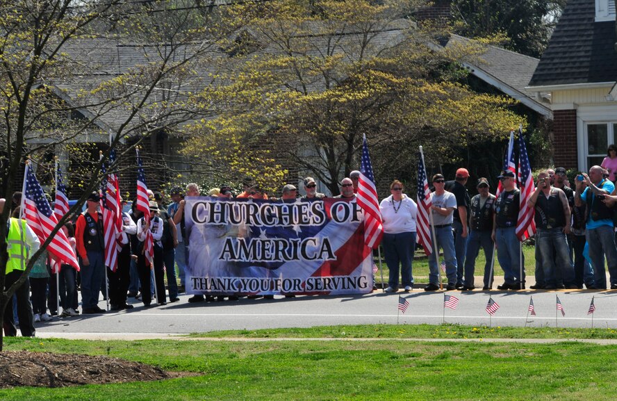 ANDERSON, S.C. -- Hundreds of people line the streets for the funeral procession of Senior Airman Nicholas J. Alden, Anderson, S.C., March 19, 2011. Airman Alden, assigned to the 48th Security Forces Squadron, Royal Air Force Lakenheath, England, was killed during a shooting March 2 at Frankfurt International Airport. More than 1,000 locals gathered to honor Airman Alden. (U.S. Air Force photo/Tech. Sgt. Vincent A. Mouzon) 