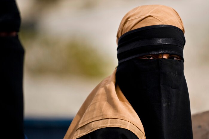 NEVADA TEST AND TRAINING RANGE -- Airman 1st Class Stephanie Harris, 820th Base Defense Group, poses as an Iraqi villager during field training exercise at exercise Desert Eagle on the NTTR March 15. Desert Eagle is integrated training between No.1 Squadron, RAF Regiment and the 820th Base Defense Group Moody Air Force Base Ga., to improve both nations ability to work together during present and future contingencies. (U.S. Air Force photo by Airman 1st Class George Goslin)