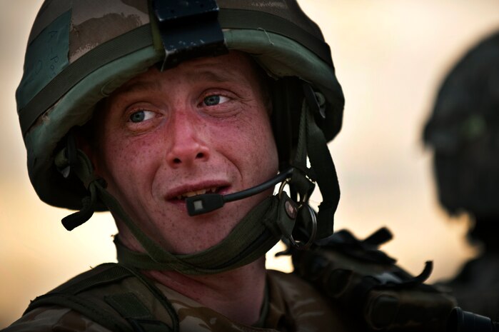 NEVADA TEST AND TRAINING RANGE -- Royal Air Force Senior Aircraftsman Jack Hunter from No. 1 Squadron, Regiment 4 Force Protection Wing security forces man a  observation point during a field training exercise on the NTTR as part of exercise Desert Eagle March 14. Desert Eagle is an integrated training between No. 1 Squadron, Royal Air Force Regiment and the 820th Base Defense Group from Moody AFB, to improve both nations ability work together during present and future contingencies. (U.S. Air Force photo by Tech. Sgt. Michael R. Holzworth)