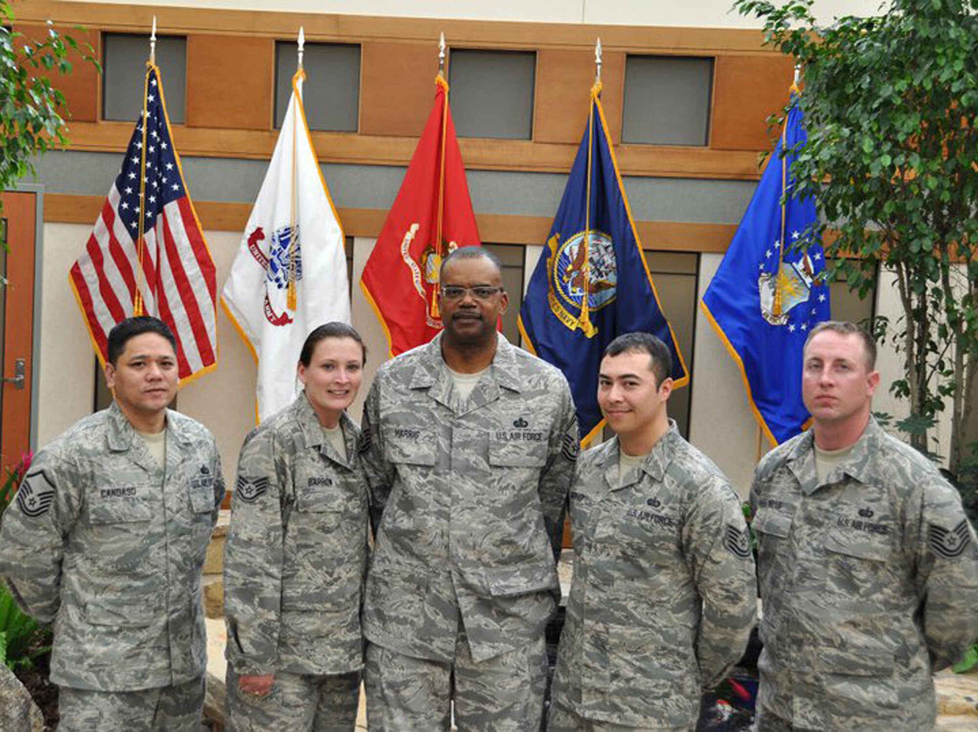U.S. Air Force Reservists from the 446th Force Support Squadron Sustainment Services Flight out of McChord Field, Wash. at the Charles C. Carson Center for Mortuary Affairs, Dover Air Force Base, Del. after finishing up a six-month deployment supporting Air Force Mortuary Affairs Operations, March 18, 2011. The Reservists have been supporting the mortuary mission in various fields from the carry team to the Fisher House for families of the fallen. (U.S. Air Force photo by Maj. Richard Komurek)