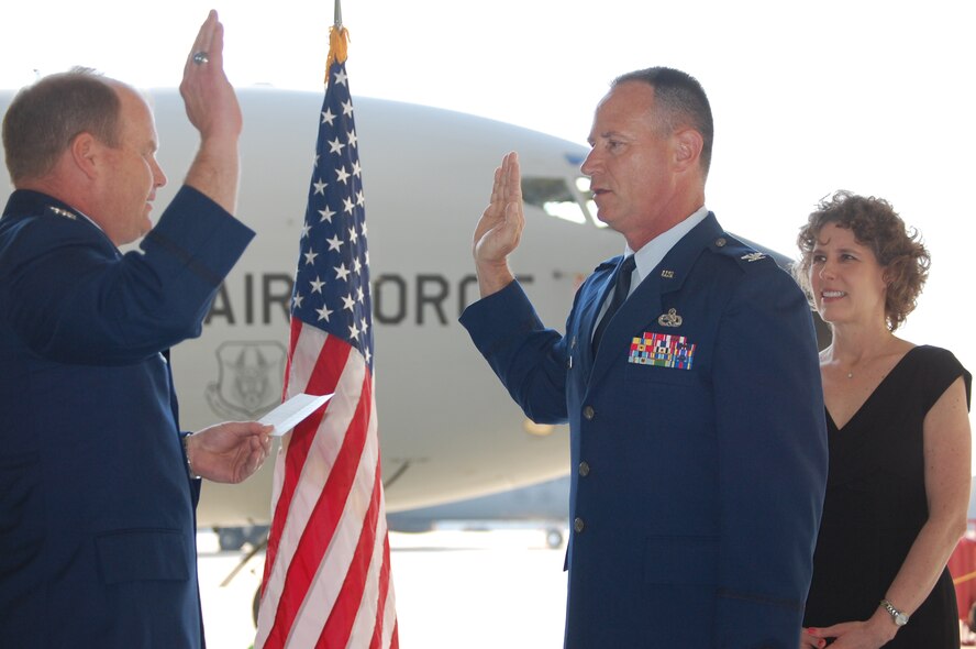 Col. Charles Combs, center, takes the oath of office after pinning on the rank of colonel during a ceremony held on Friday, March 18, His wife, Denise, and Colonel Cam LeBlanc did the honors of pinning on the new rank. (USAF photo by Maj. Shannon Mann, 916PA)