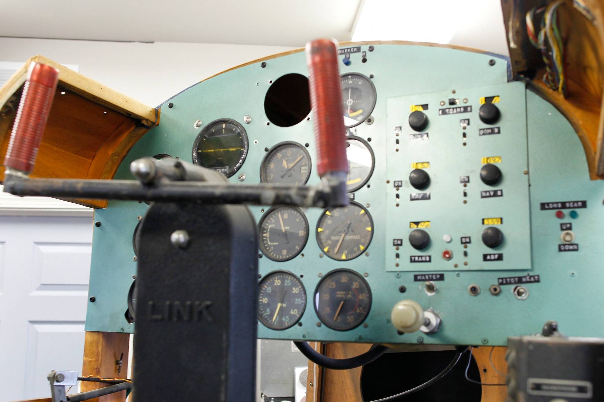 The control panel of a World War II-era Link Trainer is being restored for display at the Selfridge Military Air Museum, March 10, 2011. Museum volunteers are working on restoring the trainer, used extensively by the U.S. military in the 1930s-50s. (U.S. Air Force photo by MSgt. Terry Atwell)(RELEASED)