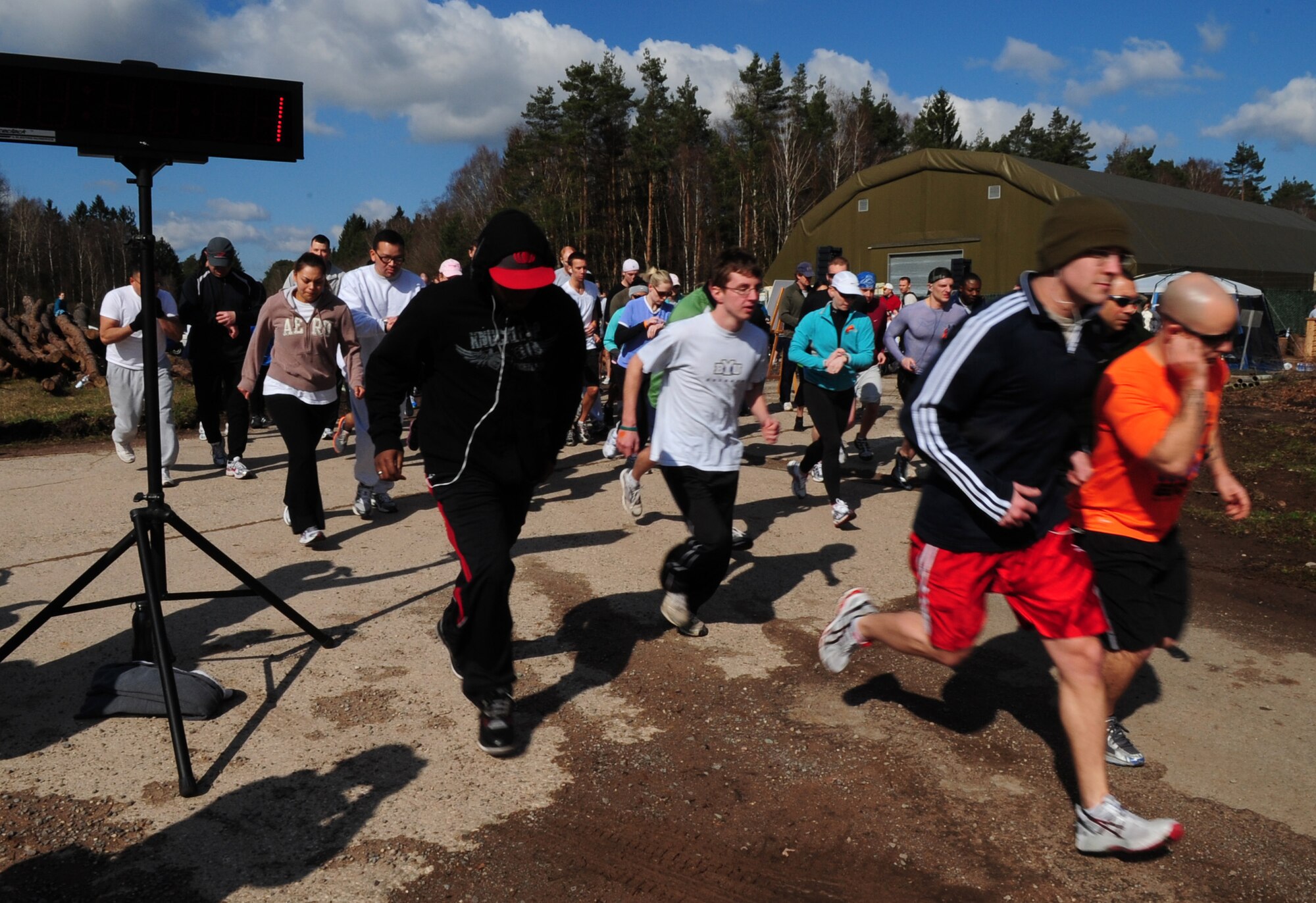 Airmen and family members rallied together for the 3rd Annual LOVESWEET Memorial 5K Run, Ramstein Air Base, Germany, March 19, 2011. The run was in honor of Tech. Sgt. Jessica Sweet, 435th Communications Squadron supply airman, who lost the battle against Acute Myeloid Leukemia in 2009. (U.S. Air Force photo by Senior Airman Brittany Perry)