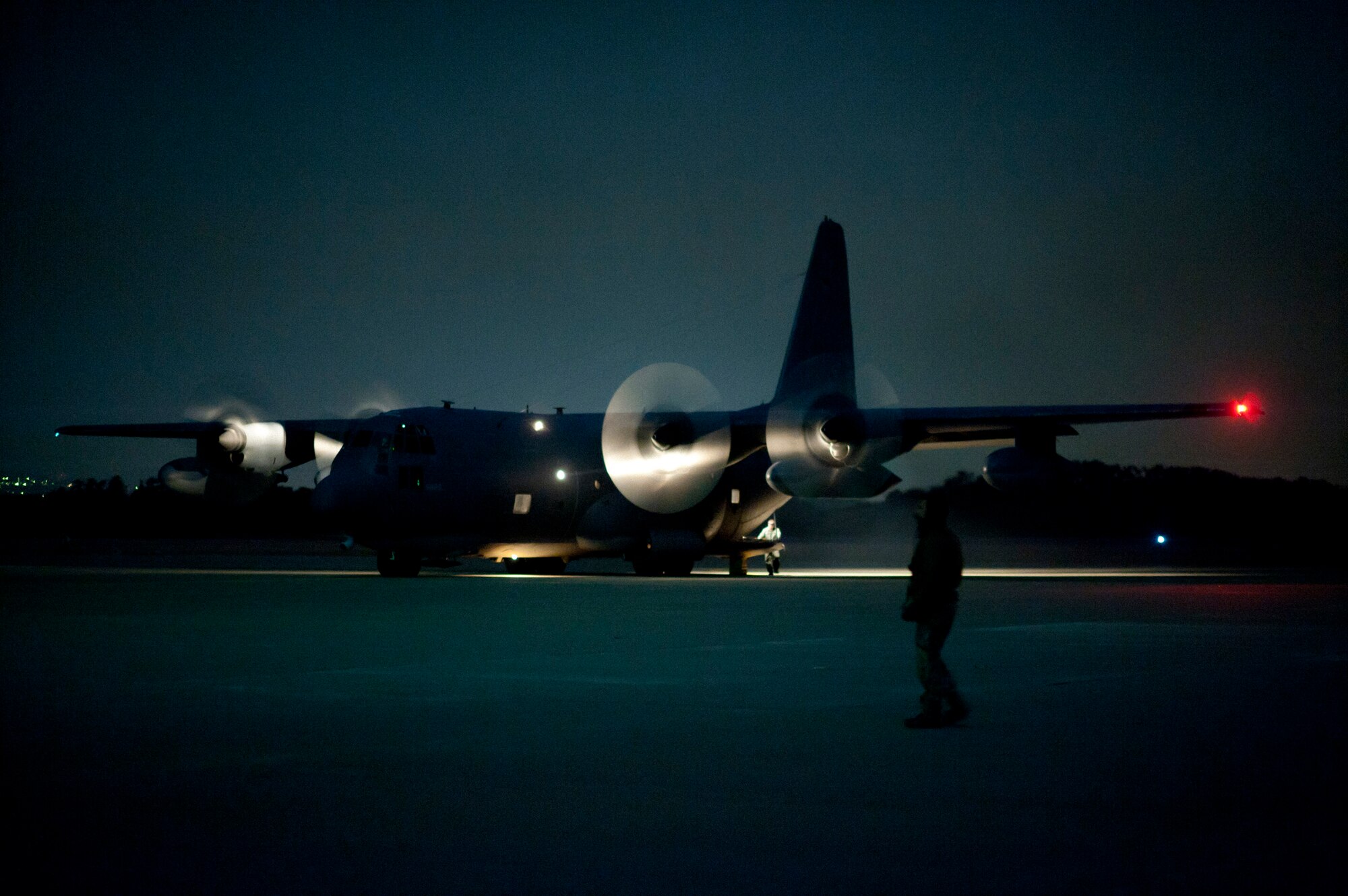 An MC-130P Combat Shadow runs its engines waiting to takeoff from Sendai Airport, Japan, March 19. The specially-equipped special operations version of the C-130 Hercules is ideally suited for nighttime missions to the newly reopened runway at Sendai with its forward-looking infrared and radar as well as improved navigation equipment. The aircraft and crew are supporting U.S. military efforts to provide assistance to Japan following the March 11 earthquake and tsunami. (U.S. Air Force photo/Staff Sgt. Samuel Morse)
