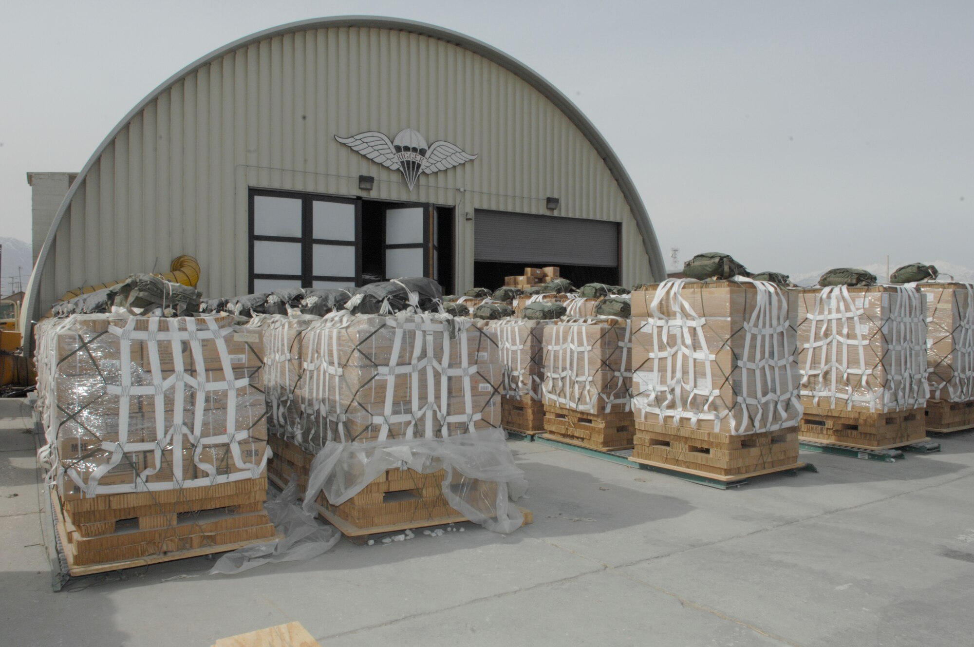 Pallets made by the 101 Sustainment Brigade Riggers await to be airdropped by the 774th Expeditionary Airlift Squadron. The 774th EAS performs 14 missions a day to provide necessities to bases around Afghanistan. (U.S. Air Force photo/Senior Airman Amber R. Kelly-Herard) 