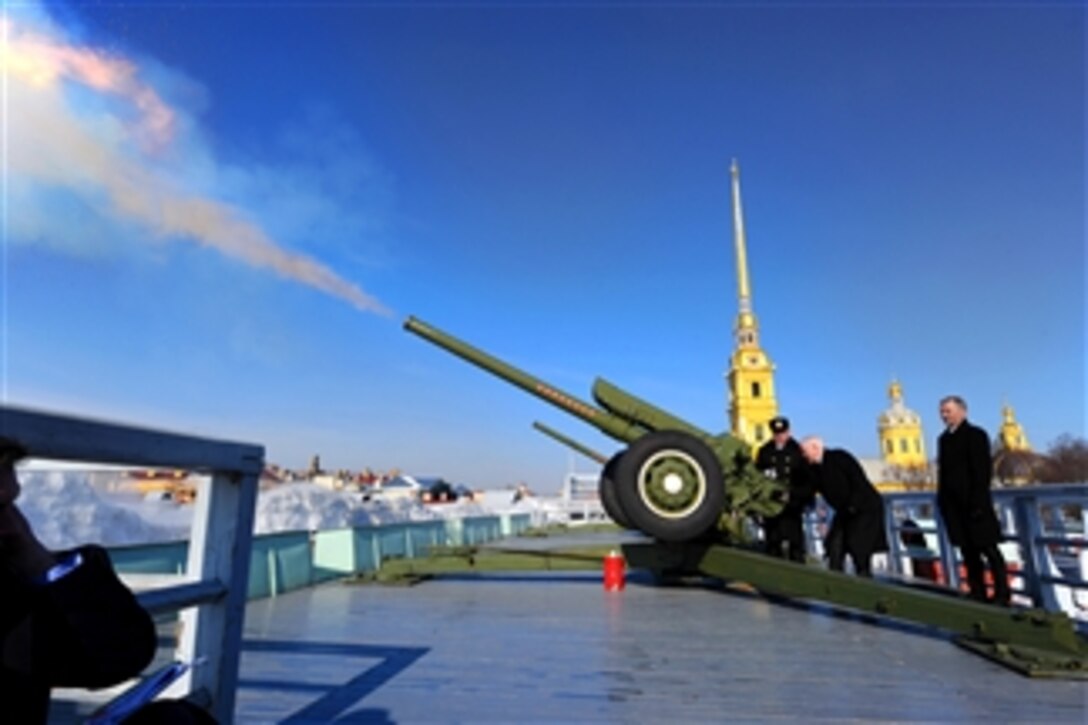 Secretary of Defense Robert M. Gates fires the "Noon Cannon" during a visit to the Peter and Paul Fortress in St. Petersburg, Russia, on March 21, 2011.  