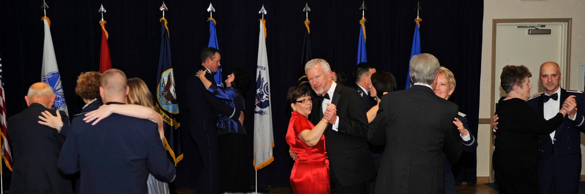 VANDENBERG AIR FORCE BASE, Calif. – The dance floor fills up after Lt. Gen. Susan Helms, the 14th Air Force and Joint Functional Component Command for Space commander, and an original member of the 14th AF Flying Tigers share the first dance during the 14th AF/JFCC Space’s Annual Awards Banquet at the Pacific Coast Club here Friday, March 18, 2011. (U.S. Air Force photo/Senior Airman Lael Huss)