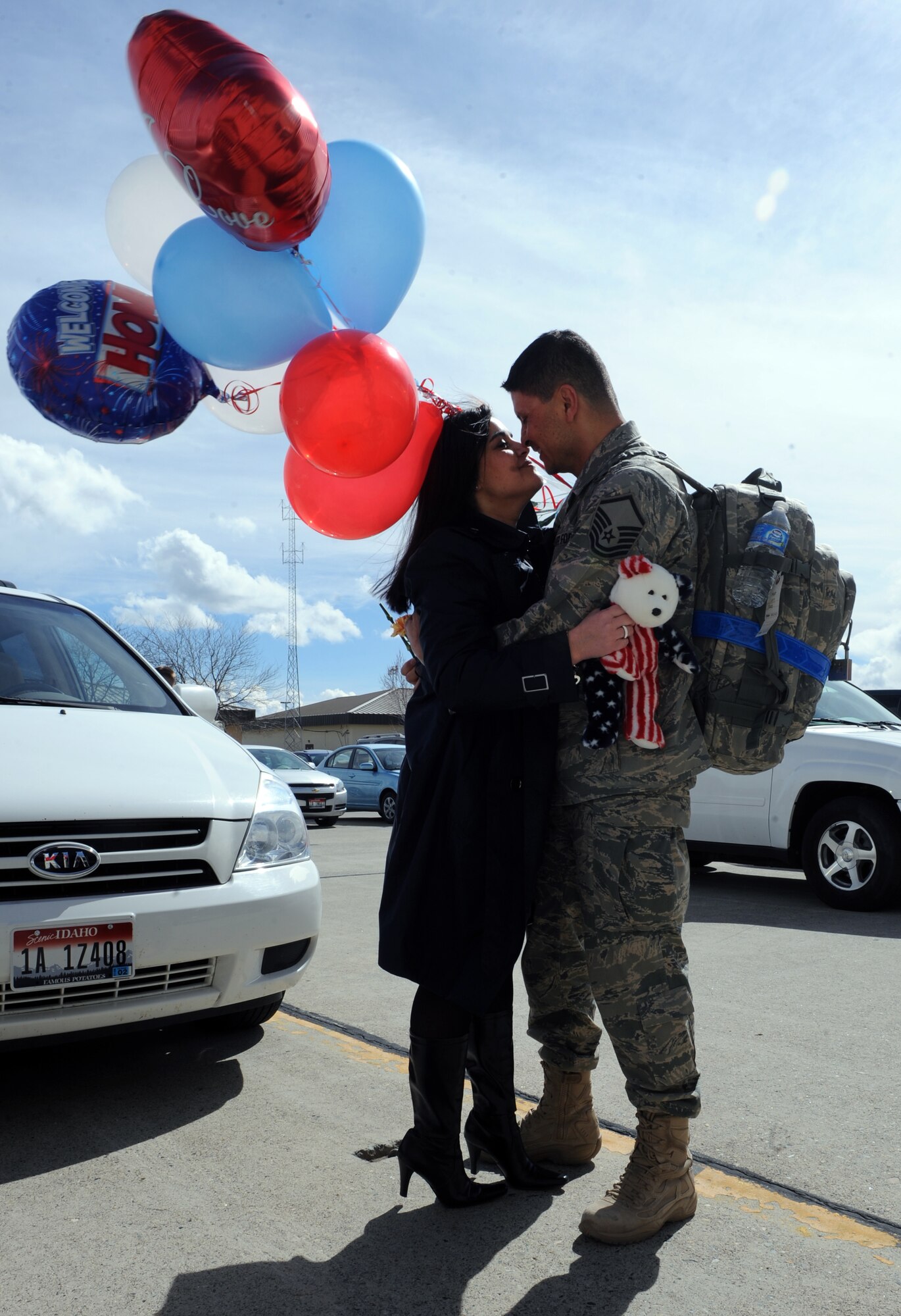MOUNTAIN HOME AIR FORCE BASE, Idaho – Master Sgt. Hector Rodriguez, 726th Air Control Squadron, reunites with his wife Corrie Rodriguez after returning from a deployment, March 19. Approximately 200 Airmen from the 726th ACS returned from a deployment to Southwest Asia in support of Operation New Dawn. The 726th ACS mission is to provide unparalleled air battle management to joint air, land and sea power anytime, anywhere and has consistently deployed one-third of its squadron for the last four years. (U.S. Air Force photo by Senior Airman Debbie Lockhart)
