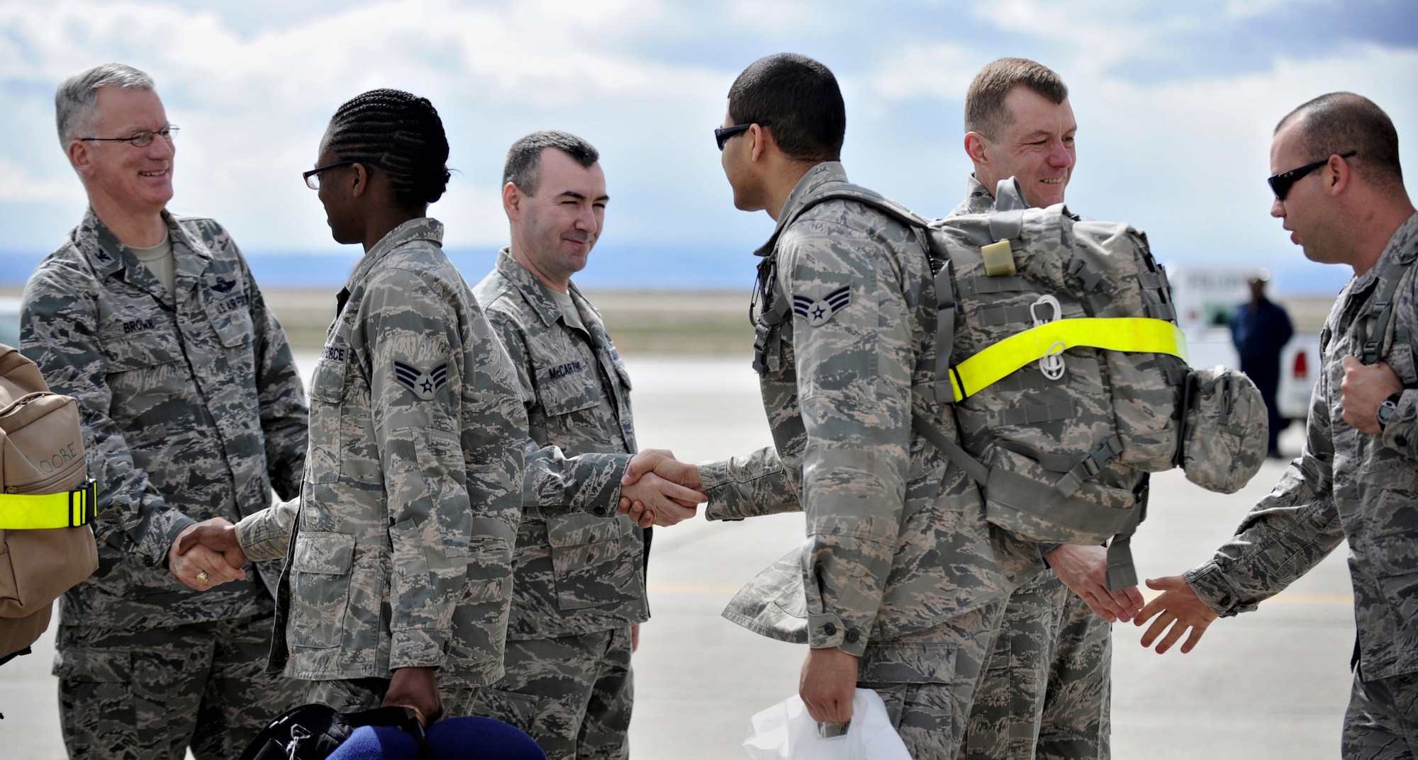 MOUNTAIN HOME AIR FORCE BASE, Idaho -- Wing leadership welcomes the 726th Air Control Squadron home from a deployment to Southwest Asia in support of Operation New Dawn March 19. For the past four years the 726th ACS has continuously deployed personnel to Southwest Asia. (U.S. Air Force photo by Airman 1st Class Renishia Richardson)