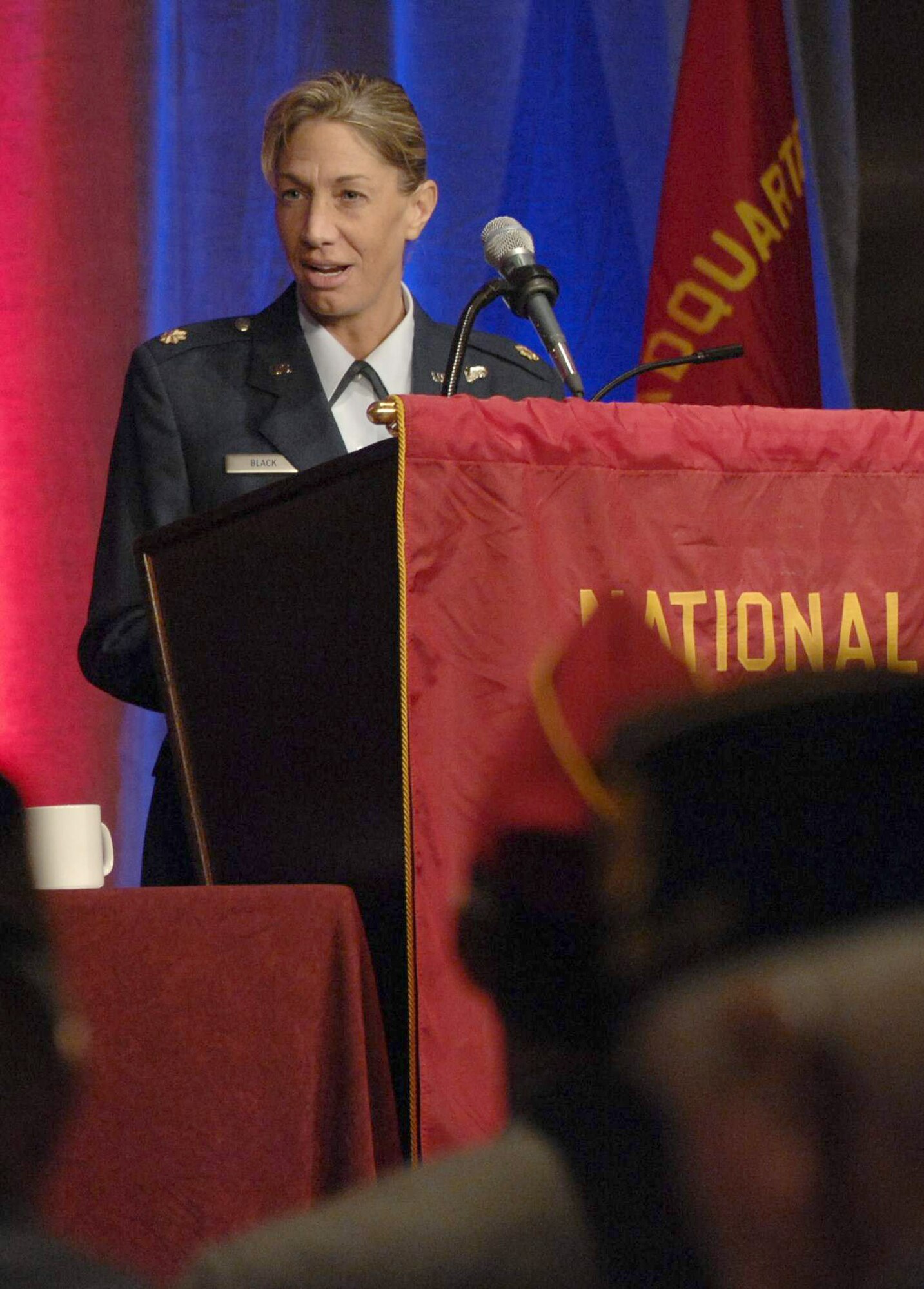 Secretary of the Air Force Public Affairs Operations Communication Team Chief Maj. Allison Black shared her experiences in modern warfare with more than 700 veterans during the American Legion mid-winter conference March 22, 2011, in Washington. The former AC-130H Spectre evaluator navigator recounted how she and her crew flew into Northern Afghanistan insurgent territory in 2001, while assigned to the 16th Special Operations Squadron at Hurlburt Field, Fla. Major Black is the first female AC-130H navigator to shoot in combat operations and the first female Air Force Combat Action Medal recipient. (U.S. Air Force photo/Staff Sgt. Tiffany Trojca)