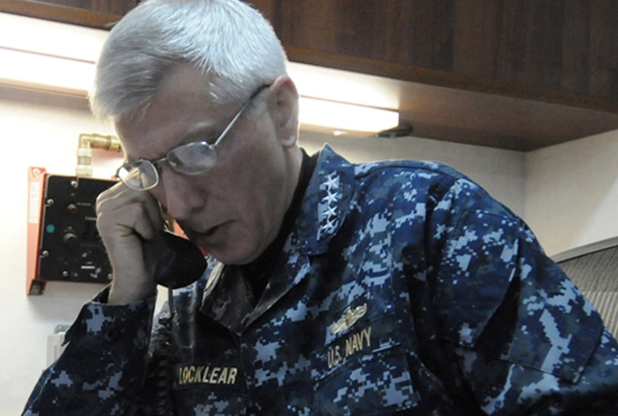 Navy Adm. Samuel J. Locklear III conducts a telephone interview with Pentagon reporters March 22, 2011, from the USS Mount Whitney in the Mediterranean Sea. Admiral Locklear is the commander of Joint Task Force Odyssey Dawn. (U.S. Navy photo) 
