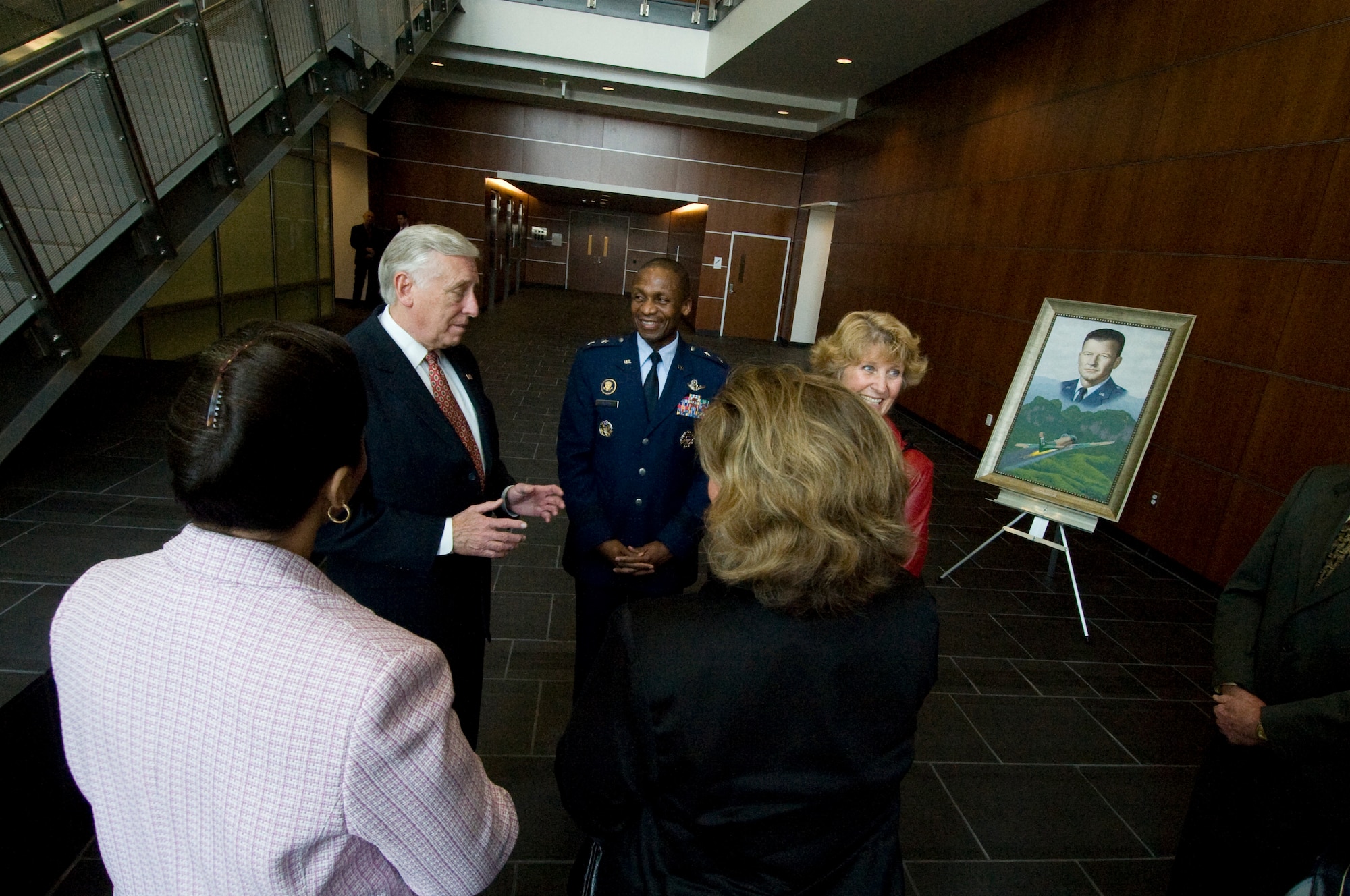 Rep. Steny Hoyer (D-Md.) talks with Maj. Gen. Darren McDew, Air Force District of Washington commander, inside the lobby of the newly dedicated William A. Jones III building during a tour of the facility March 22, 2011. Located atop 17 acres on Joint Base Andrews, the state-of-the-art facility will host 2,300 military and civilian personnel from around the National Capital Region. Col. William A. Jones III was an Air Force pilot who was shot down by enemy fire during the Vietnam War. He landed his aircraft safely, and was awarded the Medal of Honor posthumously for his efforts to locate and rescue a downed pilot. (U.S. Air Force photo by Bobby Jones) 
