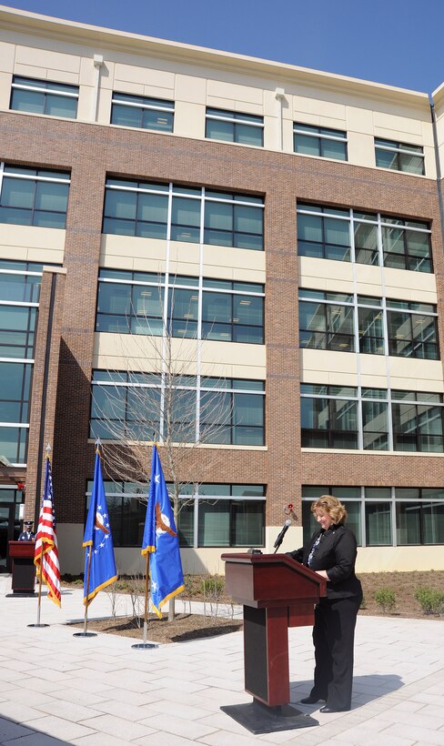 Elizabeth H. Jones, daughter of Col. William A. Jones III, speaks at the dedication of a building named for her father on Joint Base Andrews, March 22, 2011. The new William A. Jones III building is constructed of more than 20 percent recycled material and features storm water recycling systems and green roofing which will help make the infrastructure energy efficient, saving the Air Force 44.7 percent annually on energy costs compared to the offices it replaces. Colonel Jones received the Medal of Honor for providing the exact location of a downed pilot before seeking medical treatment for himself during the Vietnam War. (U.S. Air Force photo by Senior Airman Melissa V. Brownstein) 