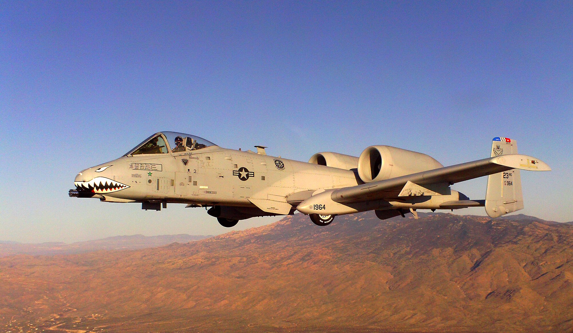 DAVIS-MONTHAN AIR FORCE BASE, Ariz.-- An A-10C Thunderbolt II is flown by Maj. Dylan Thorpe, A-10 East Demonstration Team pilot, at the 2011 Air Combat Command Heritage Flight Conference March 12. (Contributed photo) (RELEASED)
