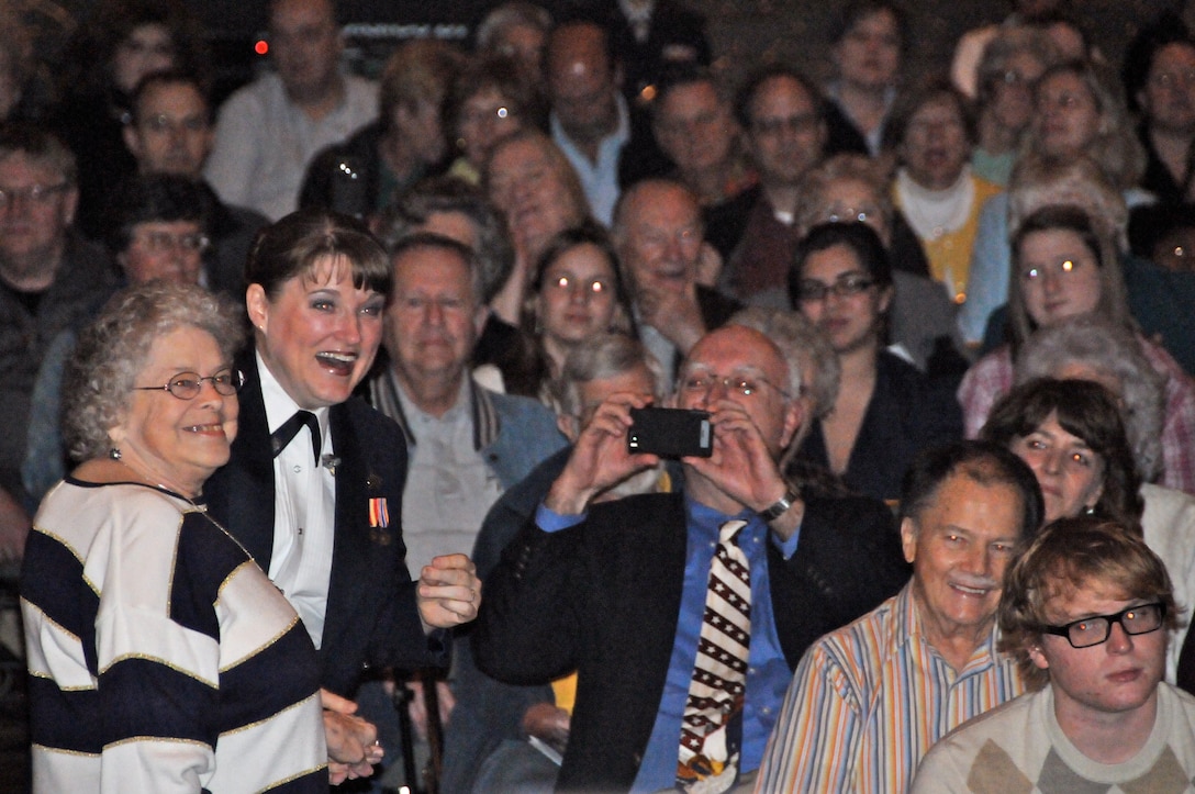 Tech. Sgt. Paige Martin, vocalist with The U.S. Air Force Band Airmen of Note, dances in the audience with Mrs. Carolyn Smith March 18 at the Meadowview Convention Center in Kingsport, Tenn. The Note is traveling through Virginia, Tennessee, Mississippi and Arkansas on it’s 2011 Spring Tour. (U.S. Air Force photo by Airman 1st Class Tabitha N. Haynes)