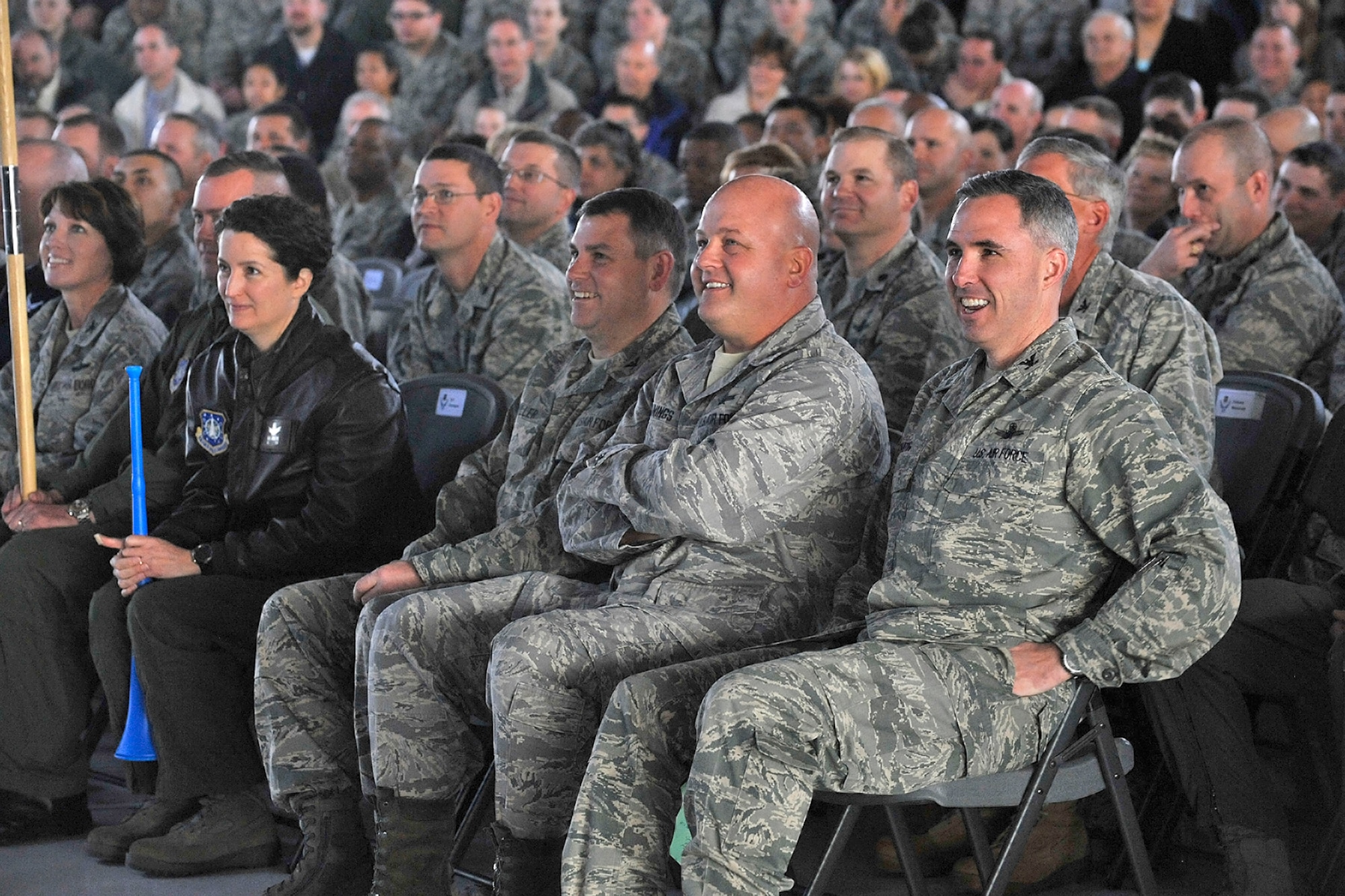 Col. Stephen N. Whiting, 21st Space Wing commander (far right) along with, Col. Jim Jennings, 21st SW vice commander; Col. James Miller, 21st SW individual mobilized augmentee to the commander; Col. Nina Armagno, 21st Operations Group commander; and Col. Kimerlee Conner, 21st Mission Support Group commander, react to comments from Headquarters Air Force Space Command Inspector General Col. Scott Gilson, who congratulated the Wing on its significant improvement from its last inspection. In the Operation Readiness Inspection portion, the wing received seven ‘Excellent’ ratings compared to 2009 when it received one.  (U.S. Air Force photo/Rob Bussard)