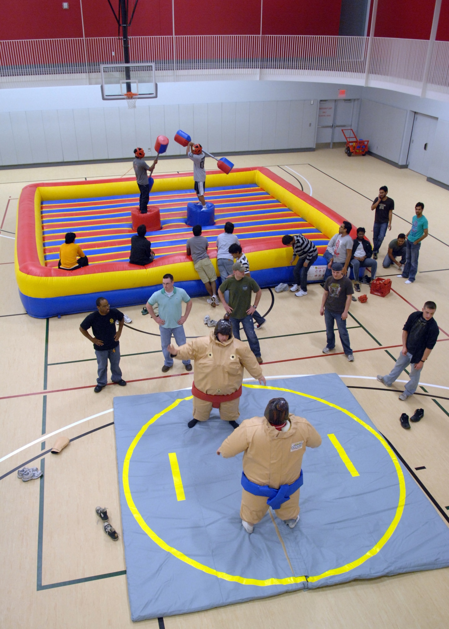 WARRENSBURG, Mo. -- Whiteman Airmen and students of the University of Central Missouri gather at the UCM Recreation Center March 18 for an array of activities, such as sumo wrestling and pugil-stick fighting. UCM fun night was sponsored by UCM and Whiteman Air Force Base. (U.S. Air Force photo by Airman 1st Class Cody H. Ramirez)
