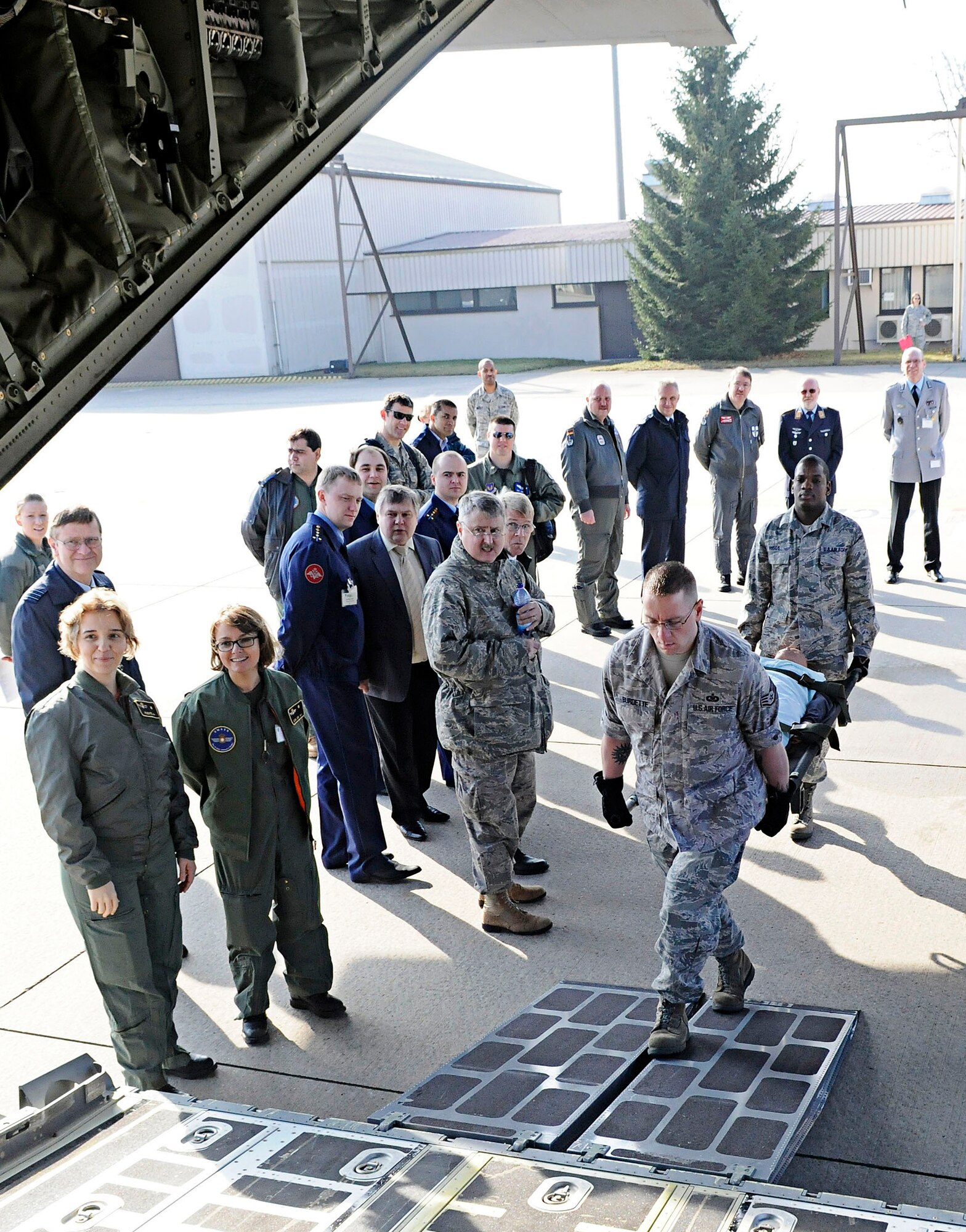 Airmen from the 86th Aeromedical Evacuation Squadron personnel demonstrate procedures for loading critical-patients March 15, 2011, at Ramstein Air Base, Germany, during the 2011 European Flight Surgeons Conference. The focus of the conference is to build partnerships and develop advancements in aeromedical evacuation and critical-care air transport. (U.S. Air Force photo/Airman 1st Class Desiree Esposito) 